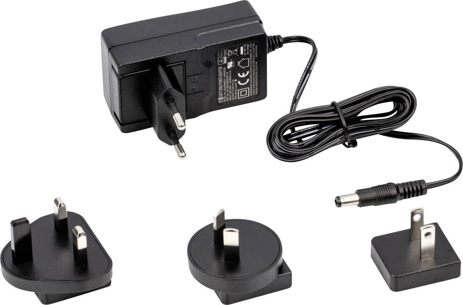 Ein schwarzes Netzteil mit Netzkabel und drei auswechselbaren, internationalen Steckaufsätzen, die für verschiedene Länder geeignet sind.