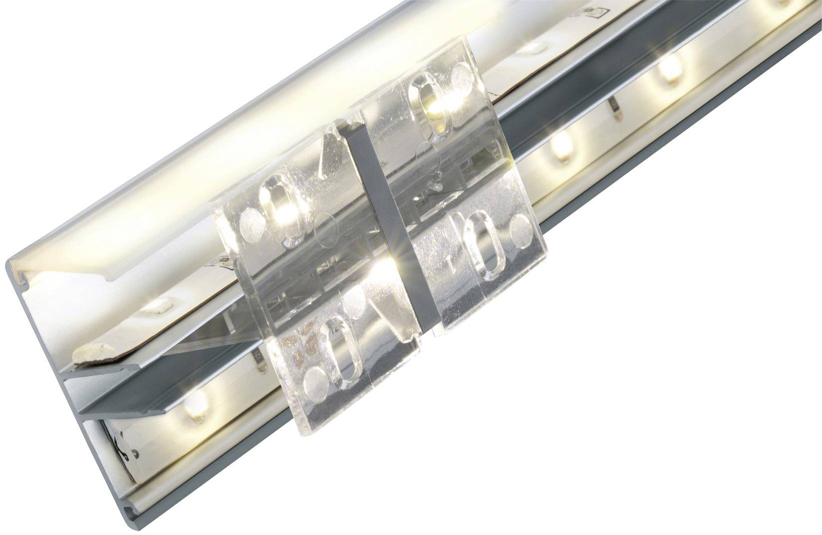 Eine LED-Leuchte mit einer transparenten Halterung und mehreren sichtbaren Leuchtpunkten, die ein gleichmäßiges Licht abstrahlen.