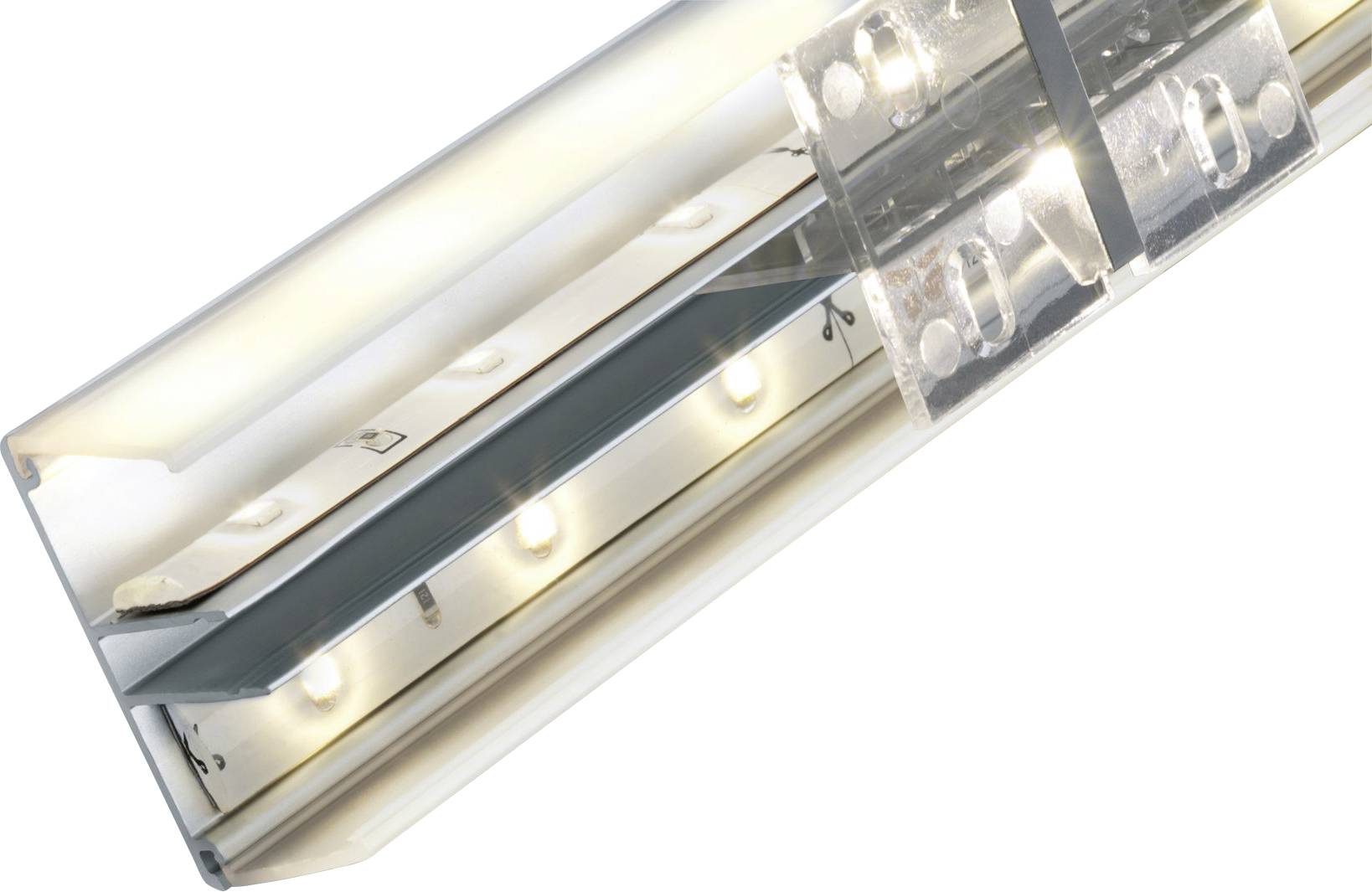 Ein reflektierendes Lichtelement mit mehreren leuchtenden LEDs in einem metallischen Gehäuse, das Licht in verschiedene Richtungen abstrahlt.