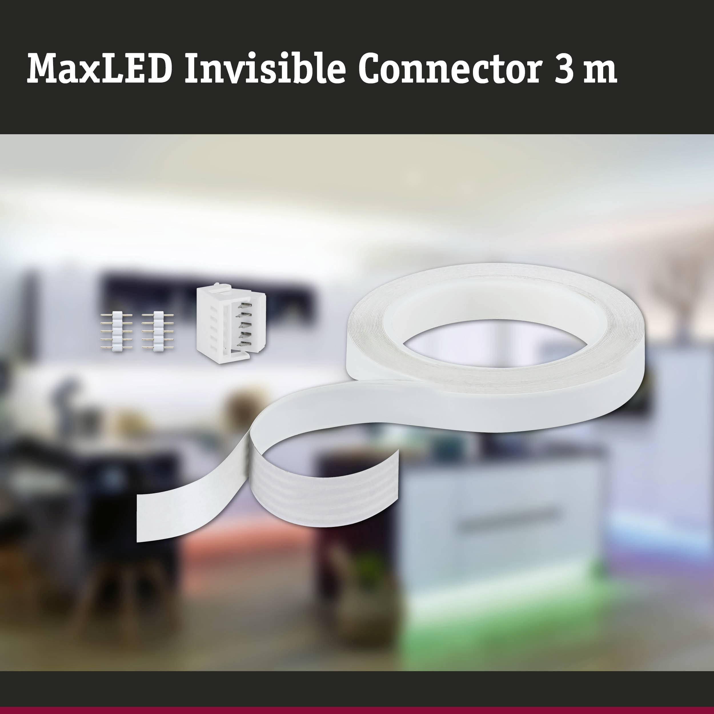 'MaxLED Invisible Connector 3 m'. Zeigt eine LED-Lichtbandrolle mit Zubehör, unscharfer Hintergrund mit modernem Wohnzimmer.