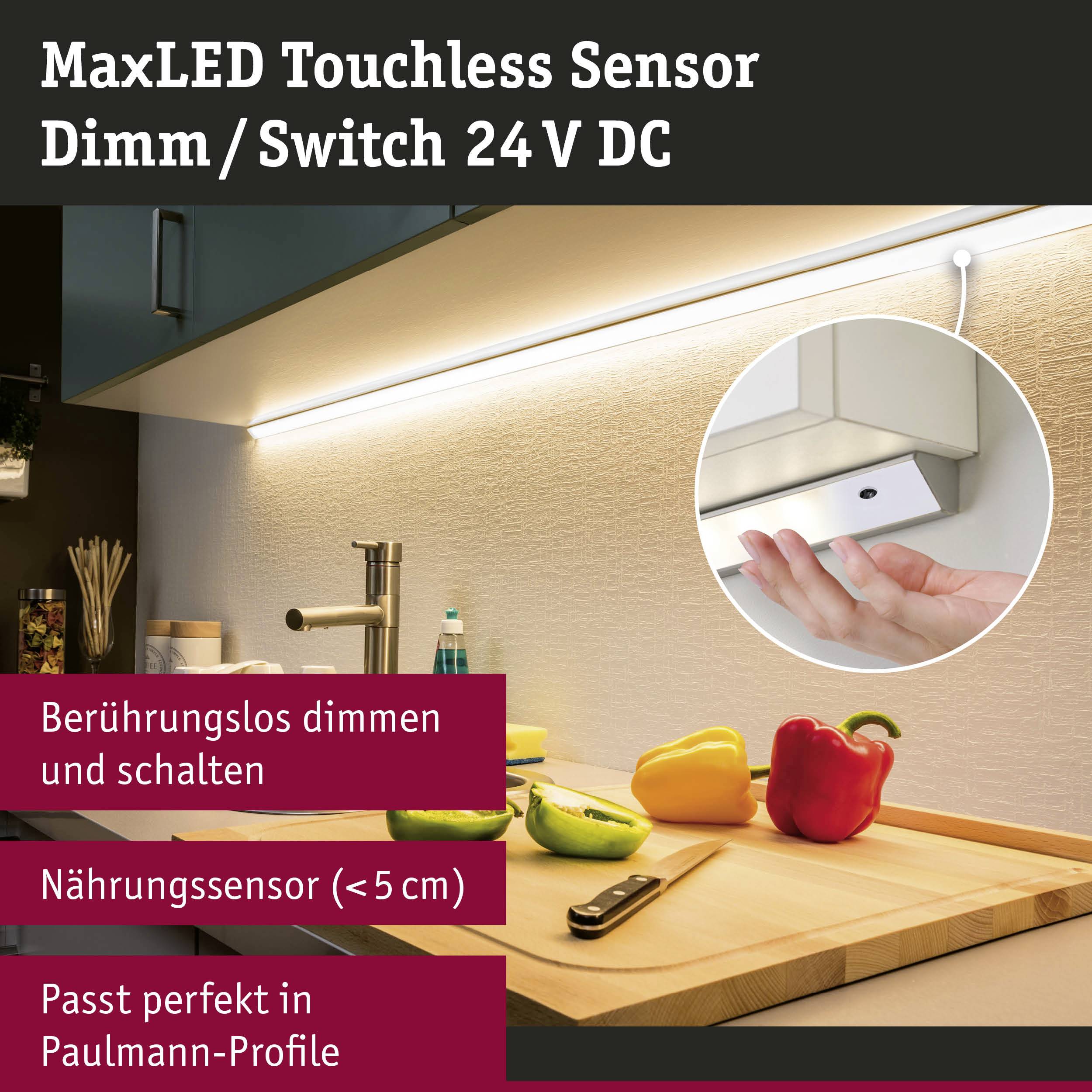 Beleuchtete Küchenzeile mit LED-Lichtleiste. Hand steuert Sensor zur Helligkeitseinstellung. Text: 'Berührungslos dimmen und schalten'.