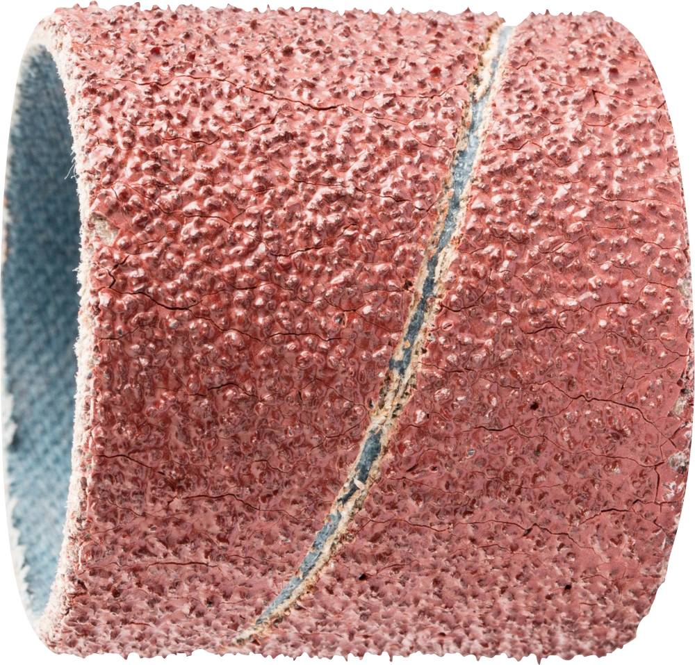 Ein Schleifbandzylinder, grobe Körnung, rosa Farbe, zum Anwendung auf einem rotierenden Werkzeug, verwendet für Oberflächenbearbeitung.