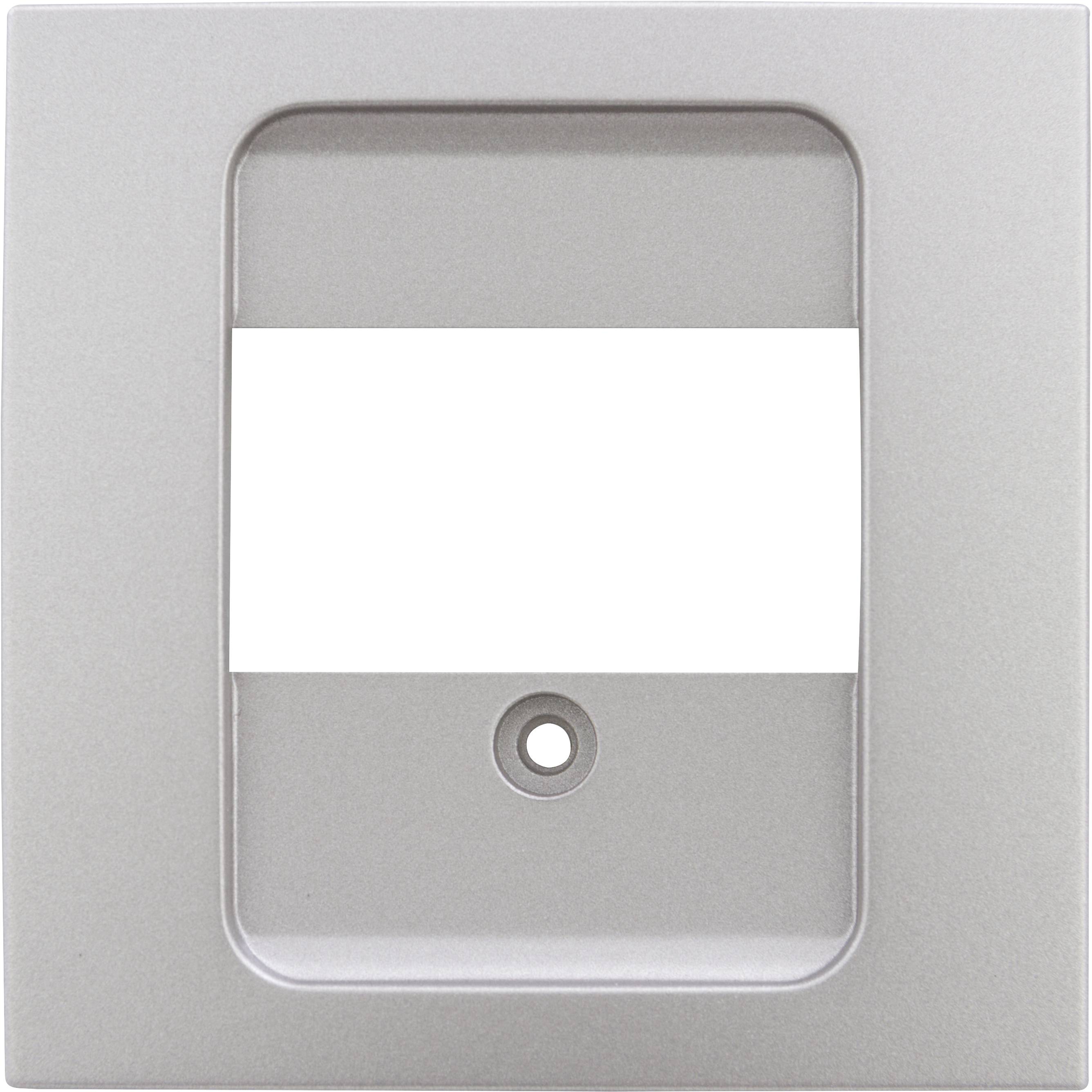 Grauer quadratischer Rahmen, möglicherweise für einen Schalter oder eine Steckdose, mit rechteckiger Aussparung und kleinem Loch unten.