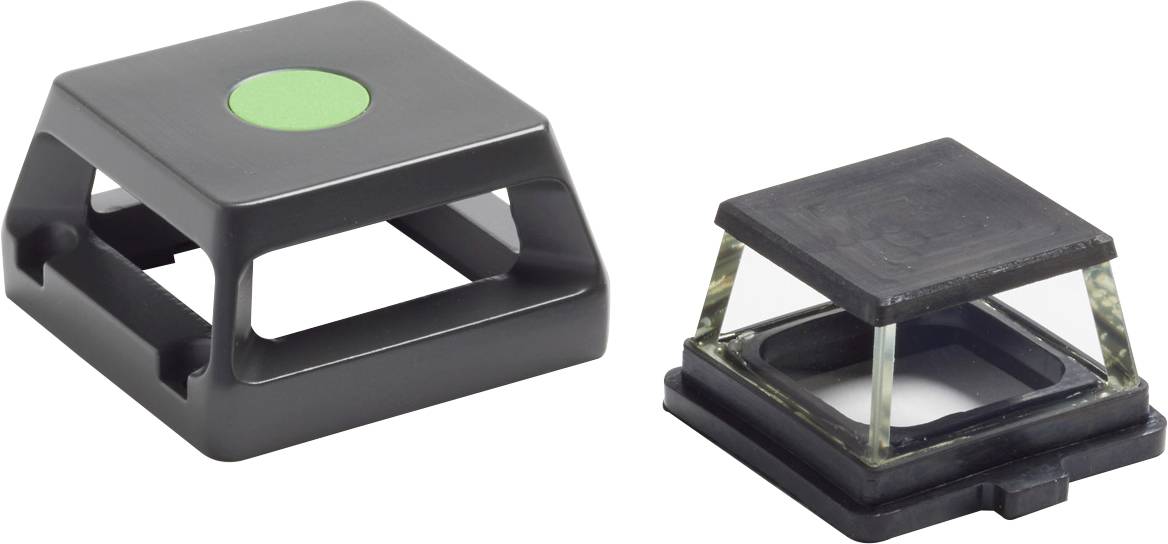 Zwei quadratische Abdeckungen aus Kunststoff: eine mit grünem Kreis oben, die andere entfernt, zeigt die Innenstruktur.