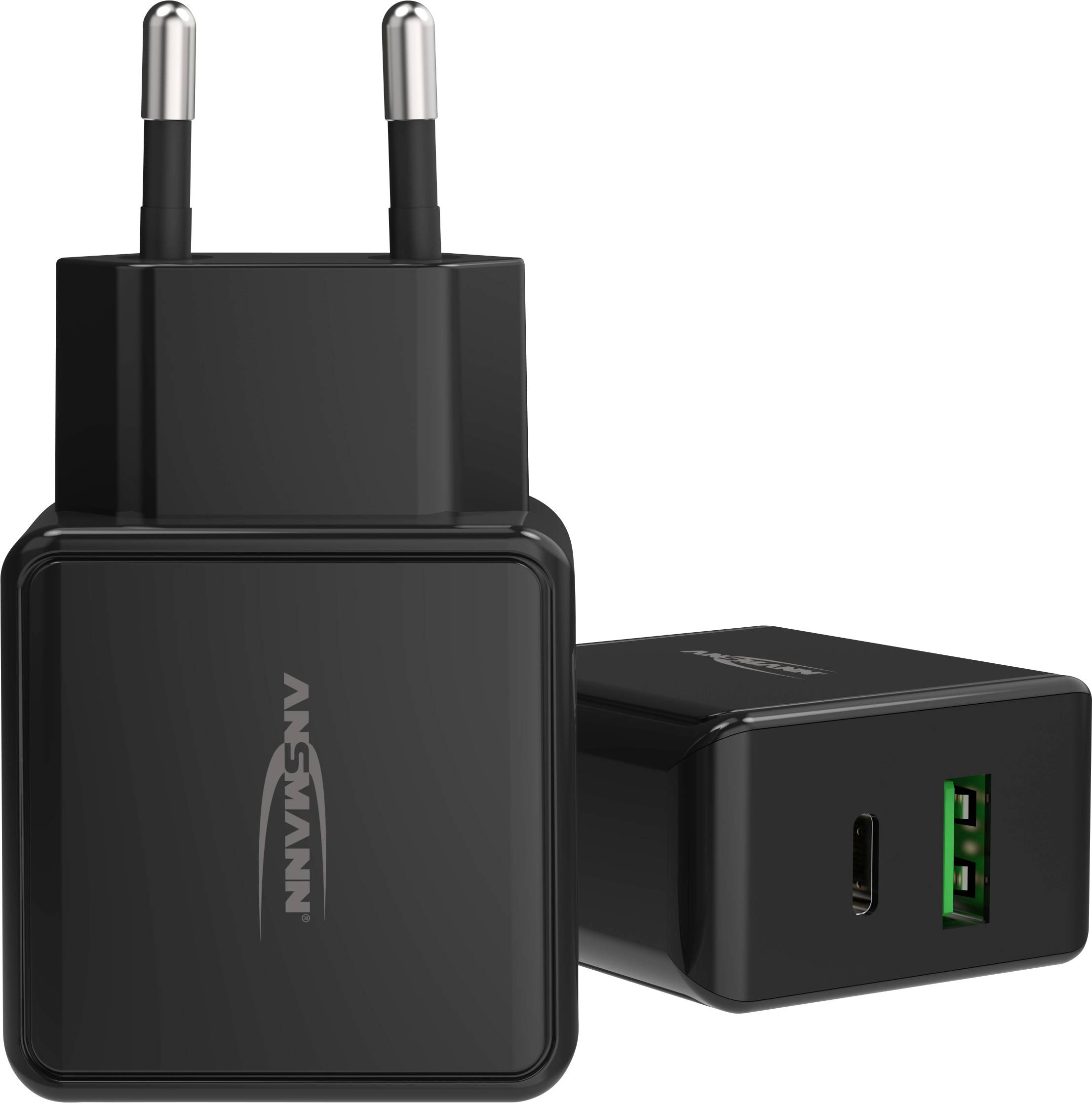 Ein schwarzes USB-Ladegerät mit zwei Steckdosen, das sowohl Standard- als auch USB-C-Anschlüsse bietet.