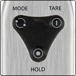 Fläche mit Bedienelementen einer digitalen Waage. Knöpfe für 'Mode', 'Tare' und 'Hold'. Kontext: Bedienung und Einstellung der Waage.