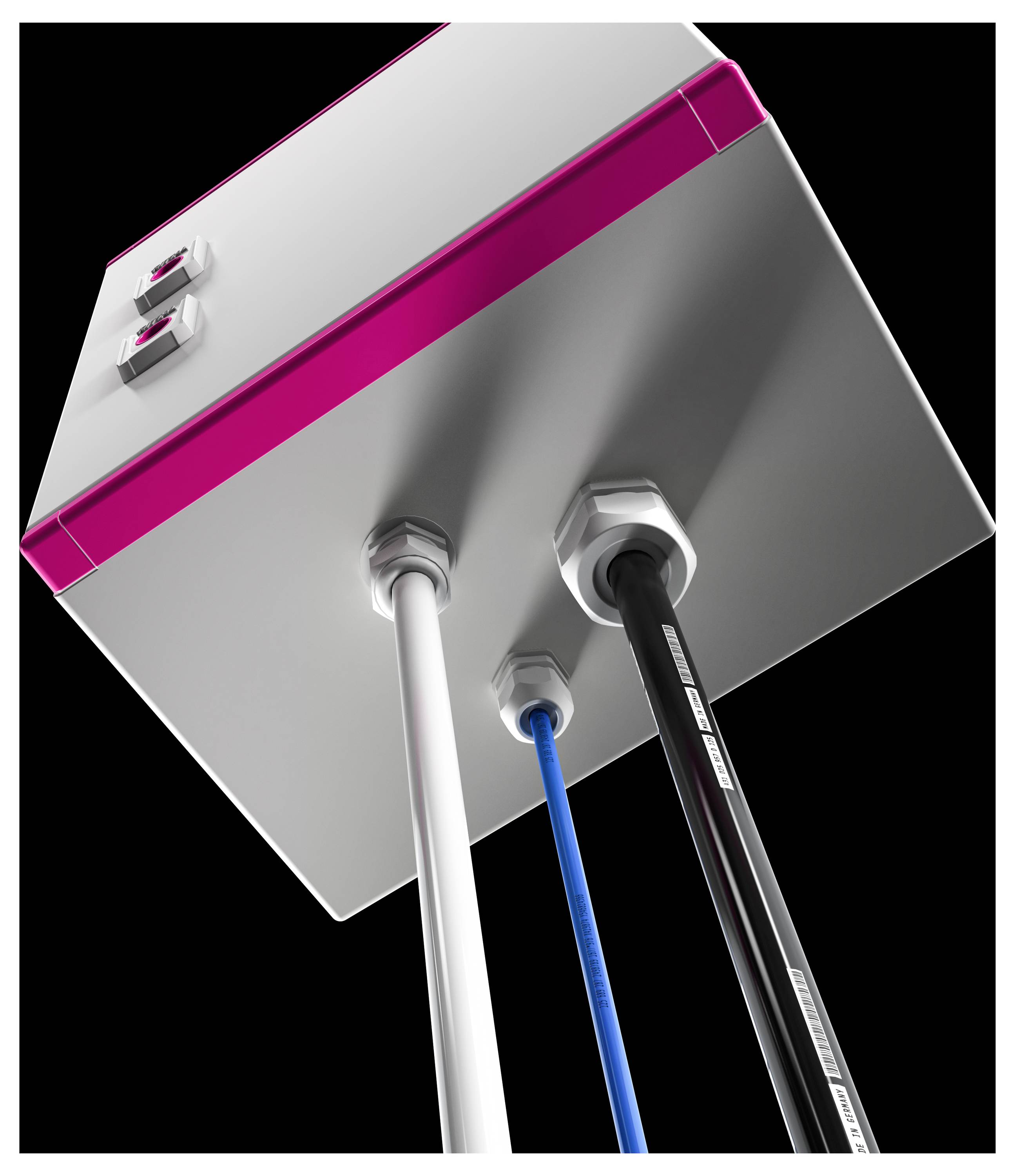Ein Kasten mit drei herausragenden, gekennzeichneten Kabeln: weiß, blau und schwarz. Oben zwei Schalter auf einer rosafarbenen Leiste.
