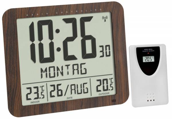 Digitale Funkuhr zeigt 10:26 Uhr, Montag, 26. August. Innentemperatur: 23,5°C; Außentemperatur: 20,5°C. Rechts: Außensensor.