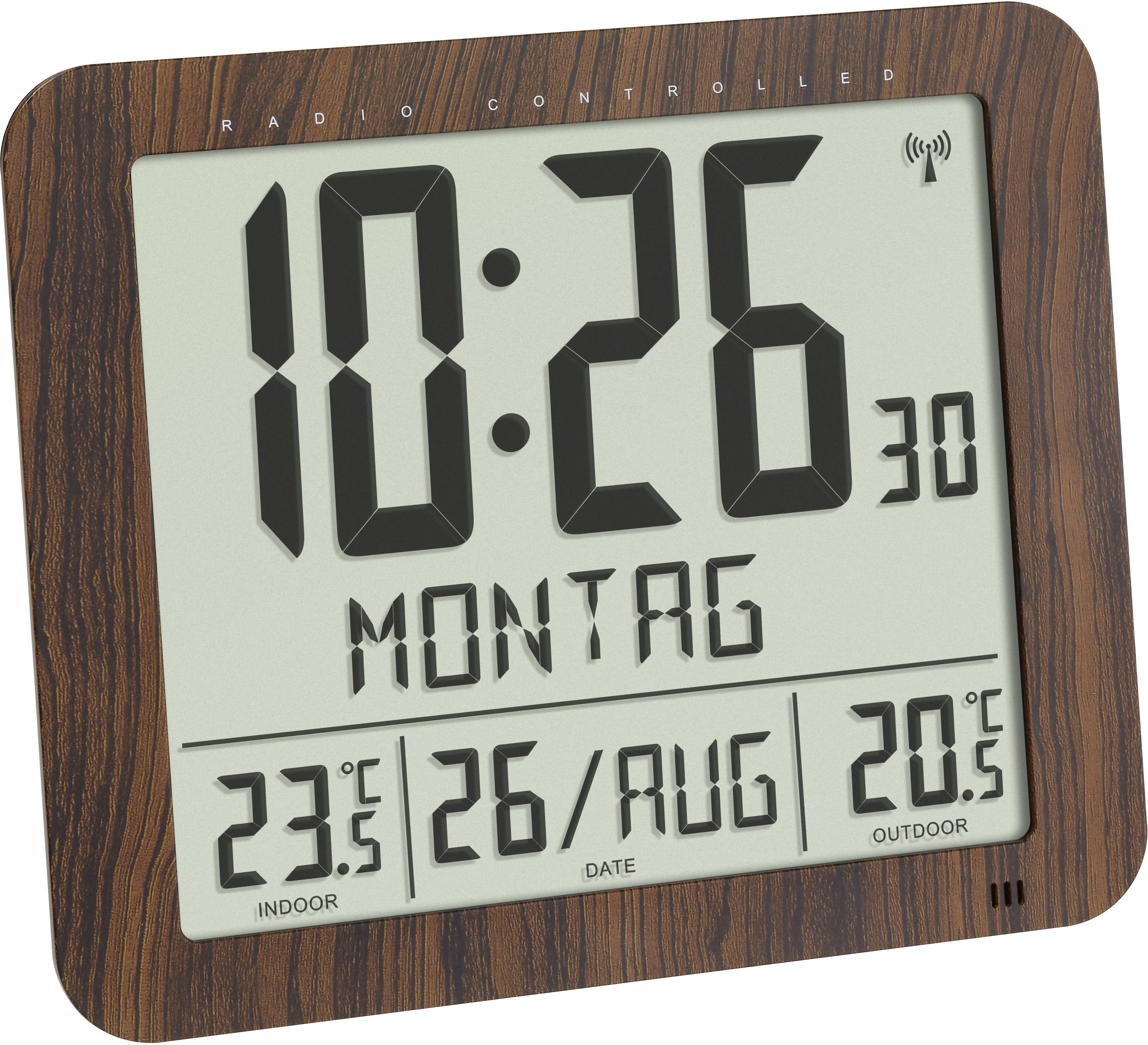 Digitale Wanduhr mit Holzoptik zeigt 10:26, Montag, 26. August. Innentemperatur 23,5°C, Außentemperatur 20,5°C.