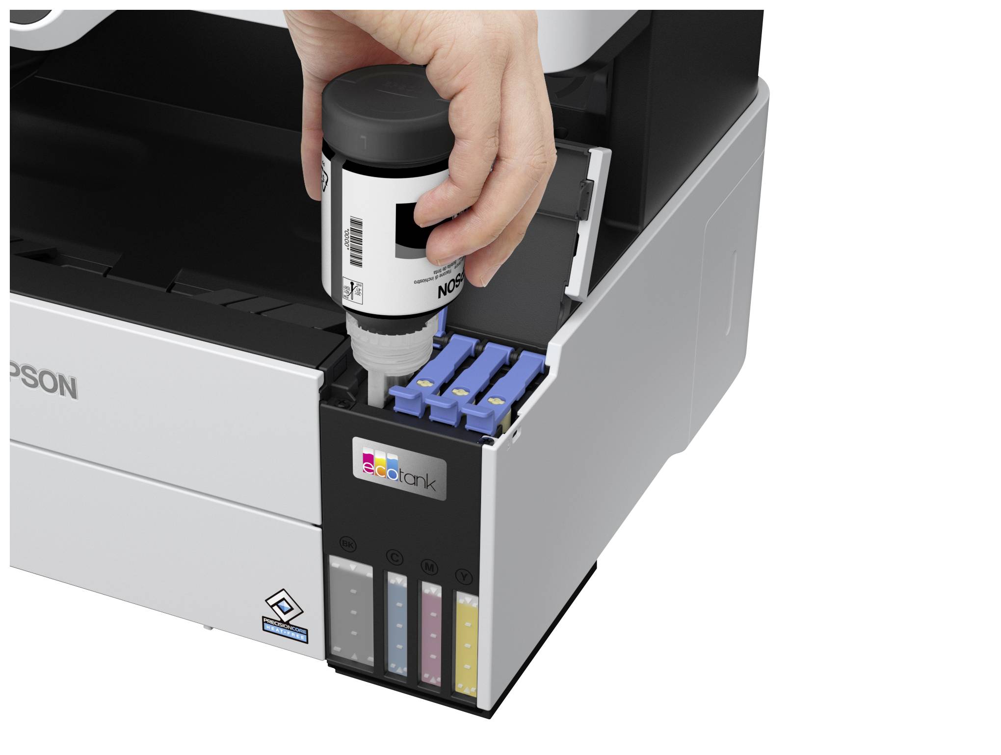 Eine Hand füllt Tinte in einen Drucker nach. Der Drucker hat vier Tintentanks in den Farben Schwarz, Gelb, Magenta und Cyan.
