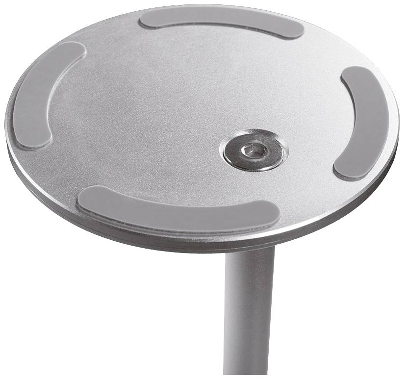 Runde, silberfarbene Metallplatte mit erhöhten, gebogenen Linien und einer Vertiefung in der Mitte, befestigt an einem Metallstab.