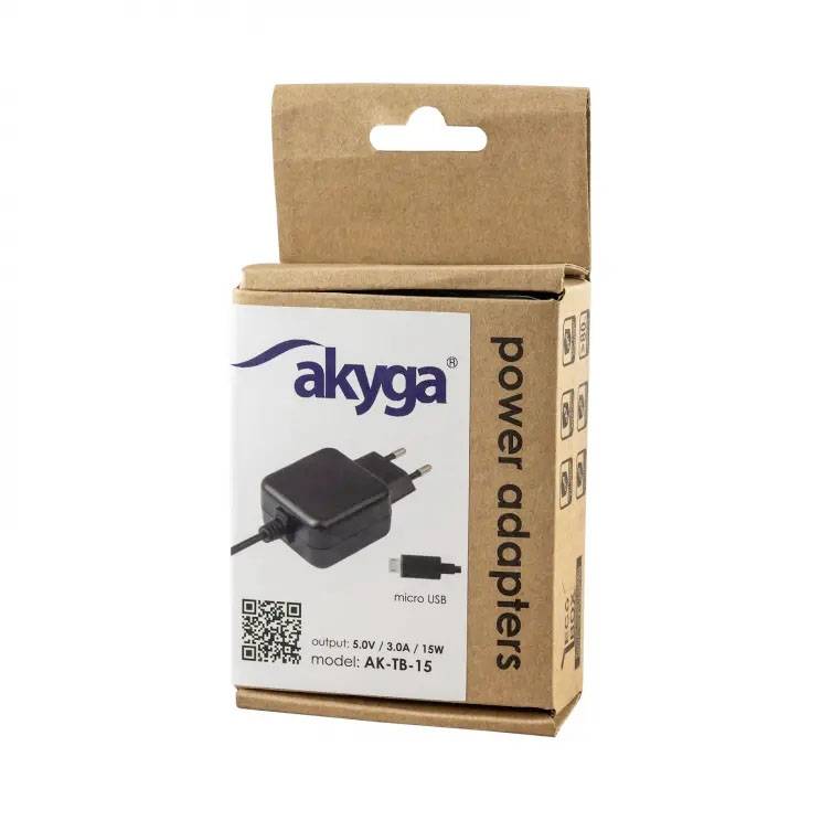 Ein brauner Karton mit der Aufschrift 'akyga power adapters', zeigt einen Netzadapter mit Micro-USB-Anschluss und technischen Details.