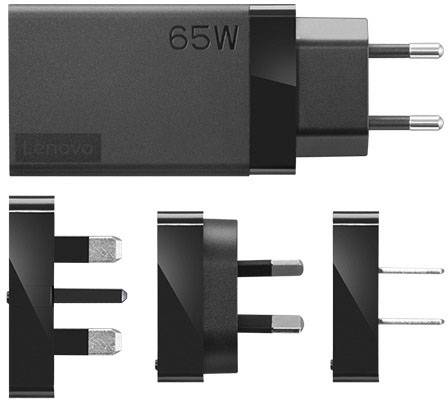 Lenovo 65W Ladegerät mit austauschbaren Steckadaptern für unterschiedliche Steckdosen.