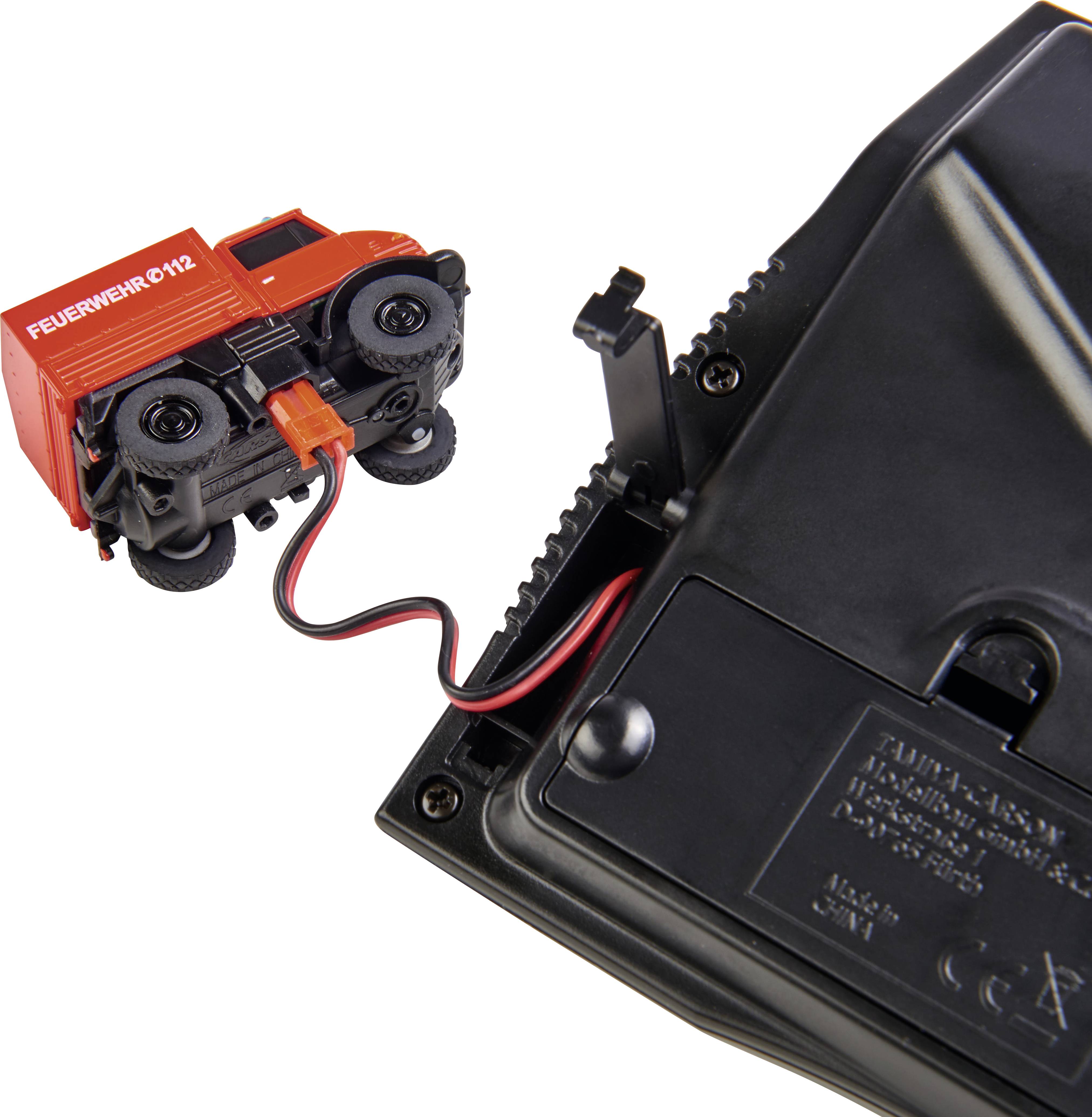 Carson Modellsport 500504139 MB Unimog U406 Feuerwehr 1:87 RC Modellauto Elektro Einsatzfahrzeug inkl. Akku, Ladegerät und