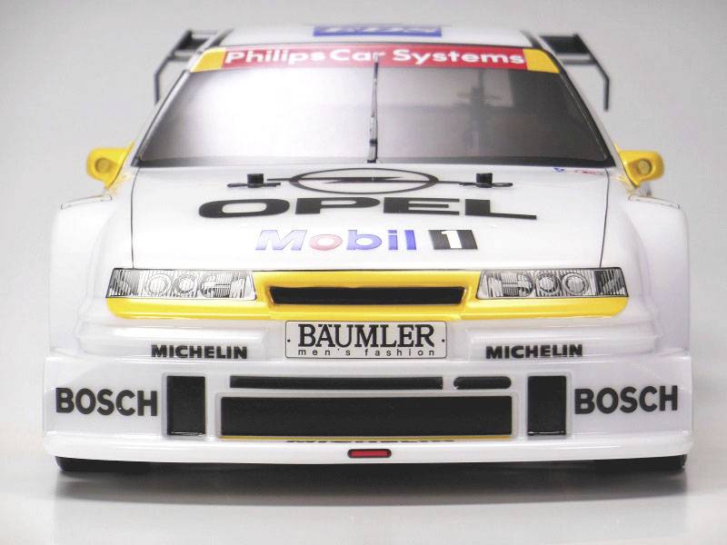 Tamiya RC Opel Calibra V6 (TA02) 4WD Brushed 1:10 RC Modellauto Elektro Tourenwagen Bausatz
