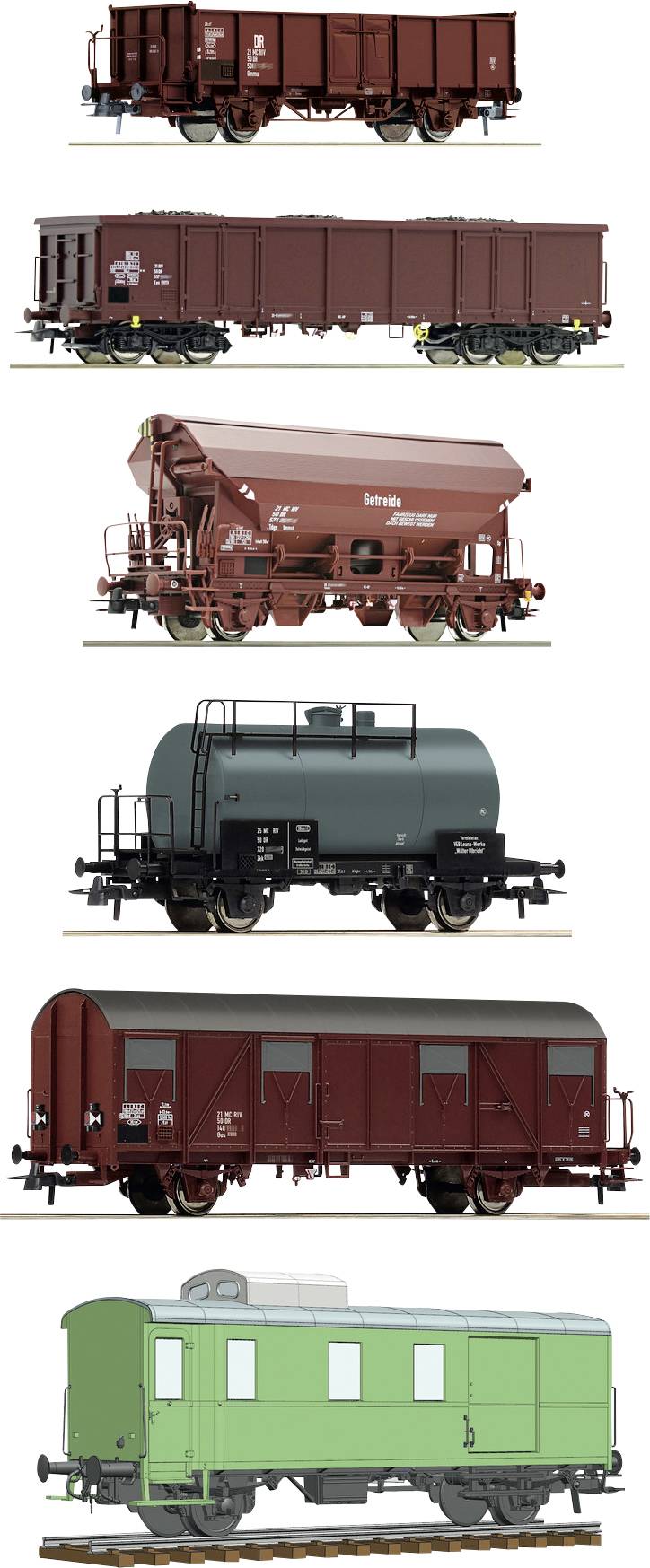 Eine Reihe von Eisenbahnwaggons, darunter Güterwagen, ein Kesselwagen, ein gedeckter Wagen und eine grüne Lokomotive.