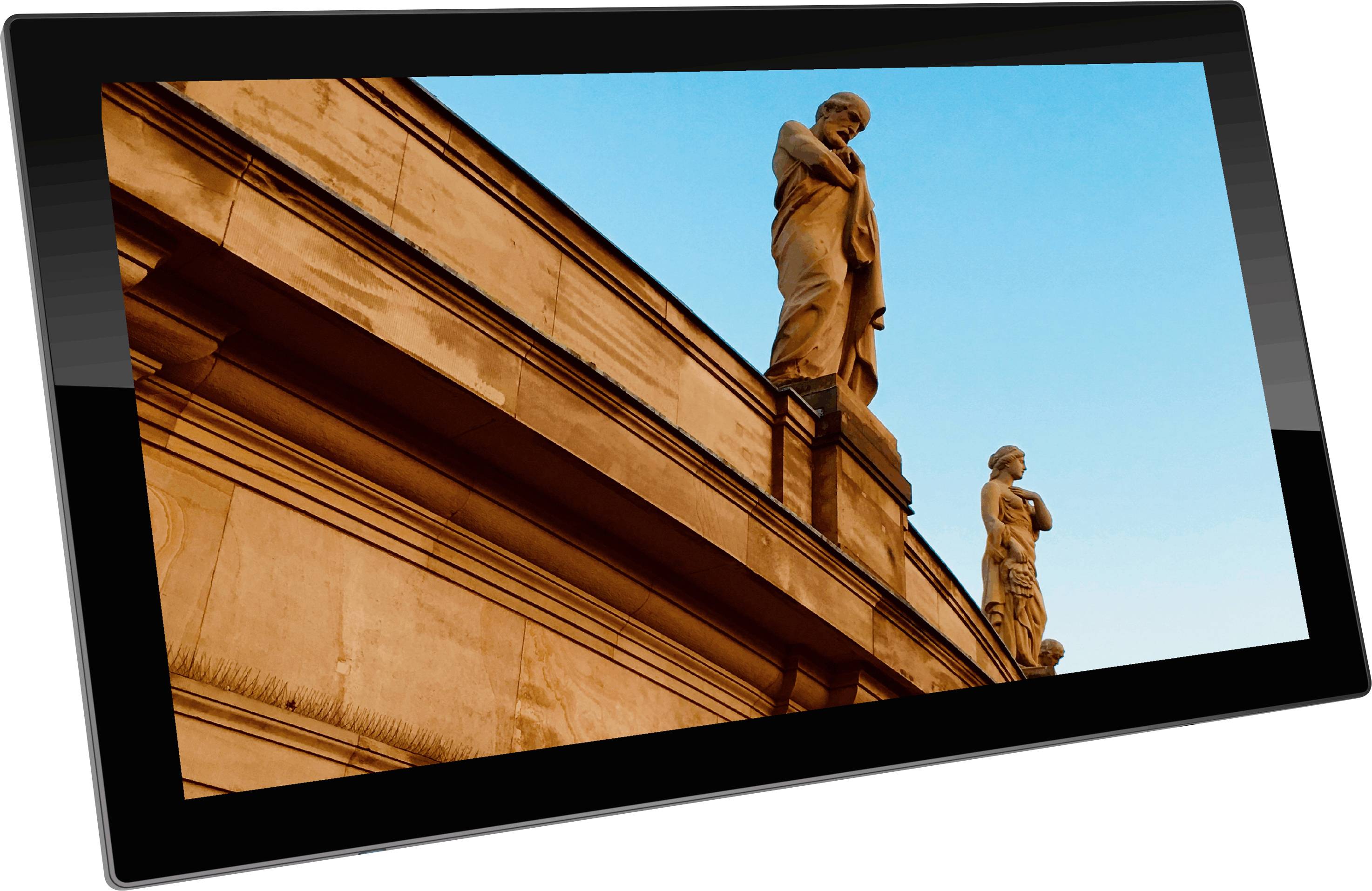 Ein Gebäude mit klassischen Statuen oben und einem klaren blauen Himmel im Hintergrund.