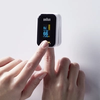 Braun YK-81CEU Fingerdrucksensor Blutsauerstoff-Messgerät YK-81CEU Braun YK-81CEU Fingerdrucksensor Blutsauerstoff-Messgerät YK-81CEU