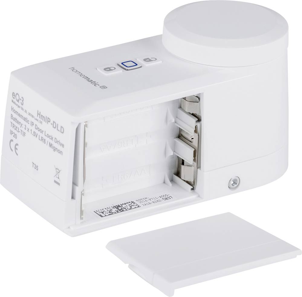 Weißes, rechteckiges elektronisches Gerät mit offenem Batteriefach, darauf eine Taste und ein LED-Licht. Batteriedeckel daneben.
