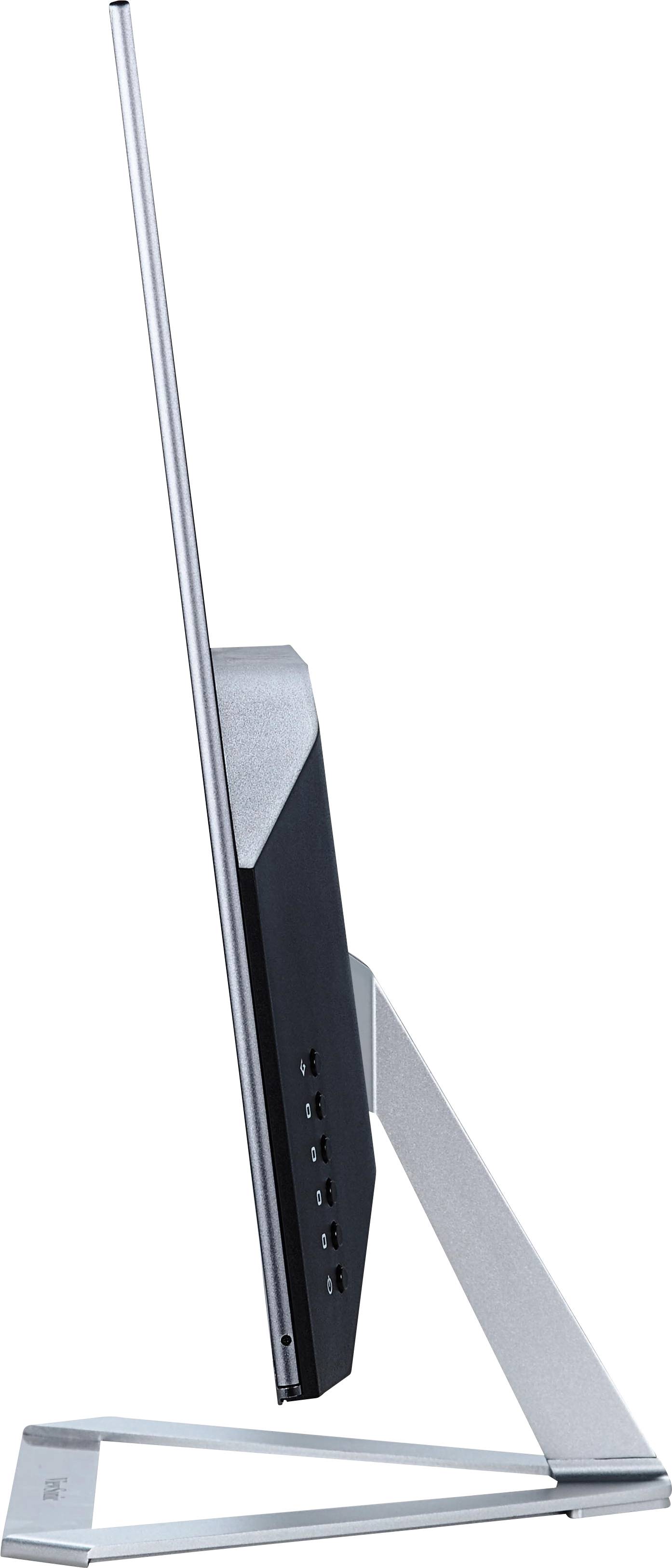Ein ultradünner Monitor in seitlicher Ansicht, mit einem schlanken Metallständer und mehreren Anschlüssen an der Seite.