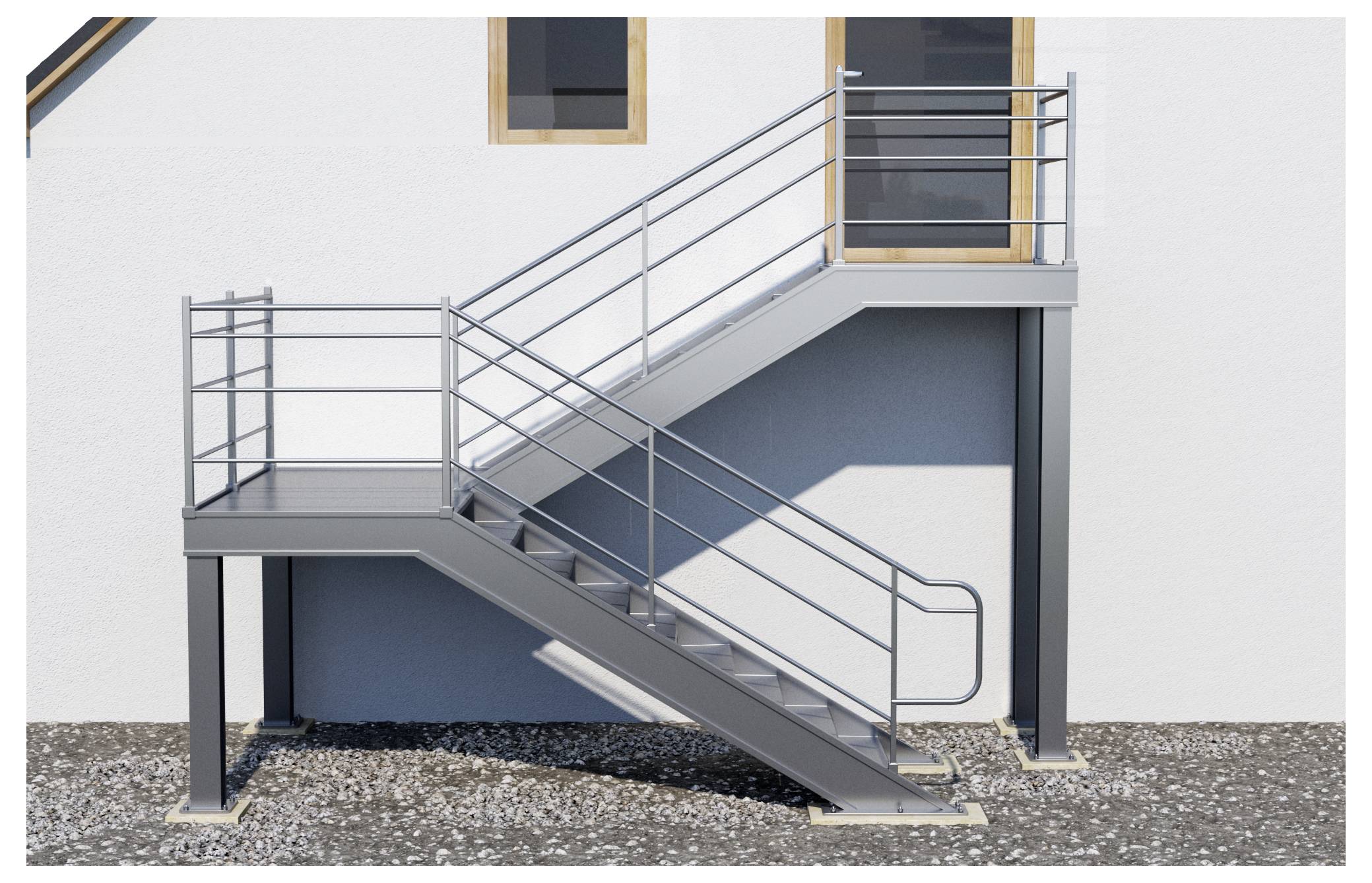 Metallische Außentreppe mit Geländern, die zu einem Gebäudeeingang hinaufführt.