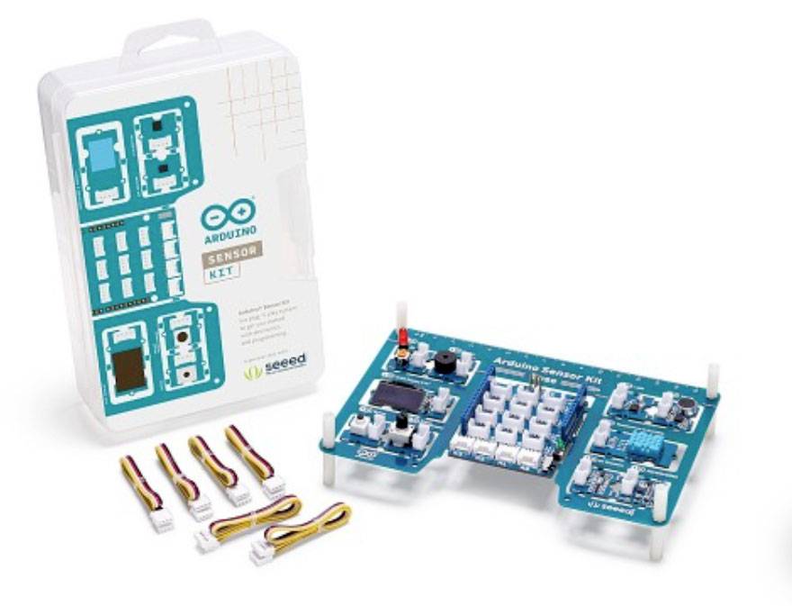 'Arduino Sensor Kit' Verpackung und Platine mit verbundenen Sensoren und Kabeln. Enthält Module für Elektronikprojekte.
