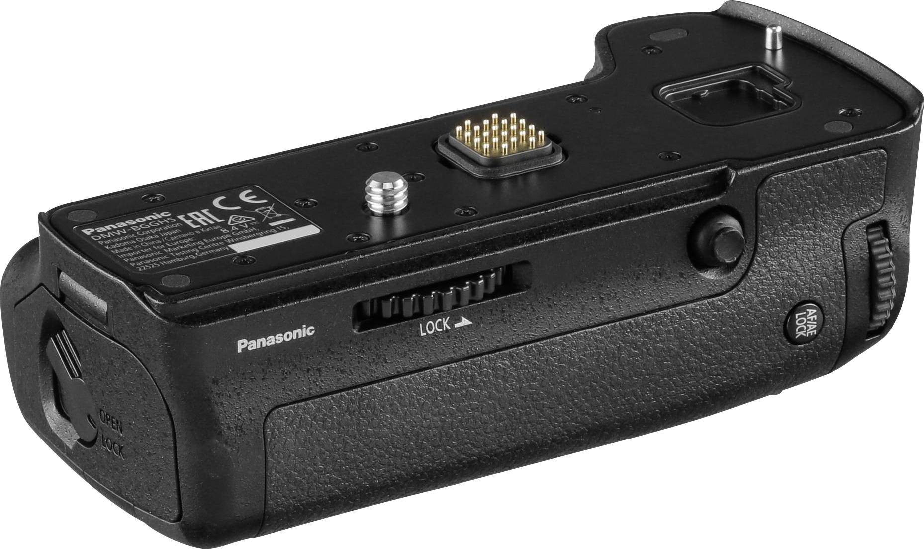 Ein schwarzer Batteriegriff einer Kamera mit Anschlüssen auf der Oberseite und dem Markennamen 'Panasonic' an der Seite.