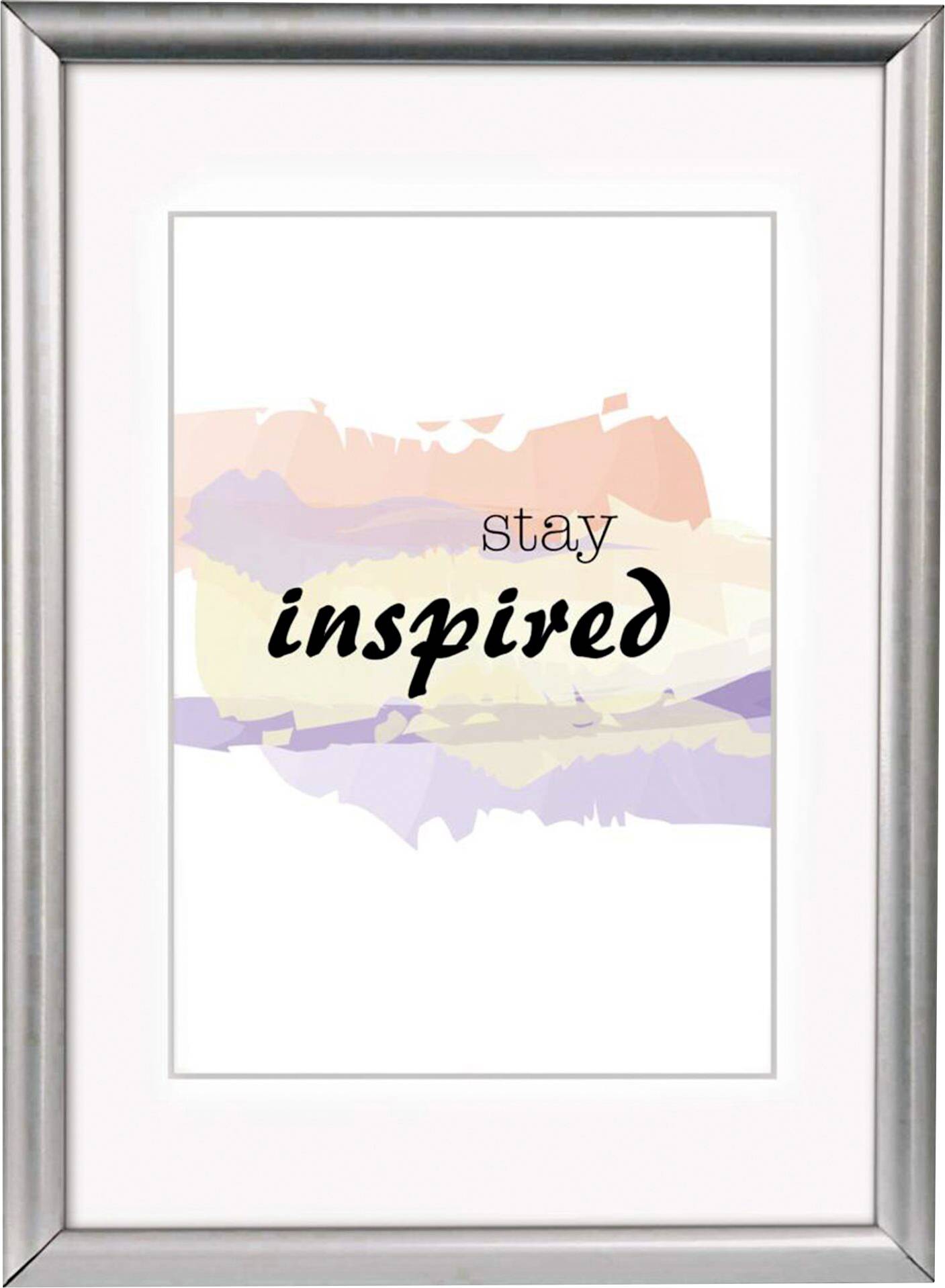 Gerahmtes Bild mit der Aufschrift 'stay inspired' vor einem bunten Aquarell-Hintergrund aus Pastellfarben.