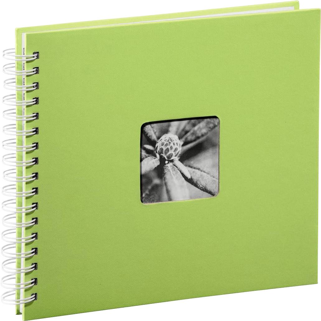 Grünes Spiralnotizbuch mit einem kleinen Schwarzweißfoto einer Blume auf dem Cover.