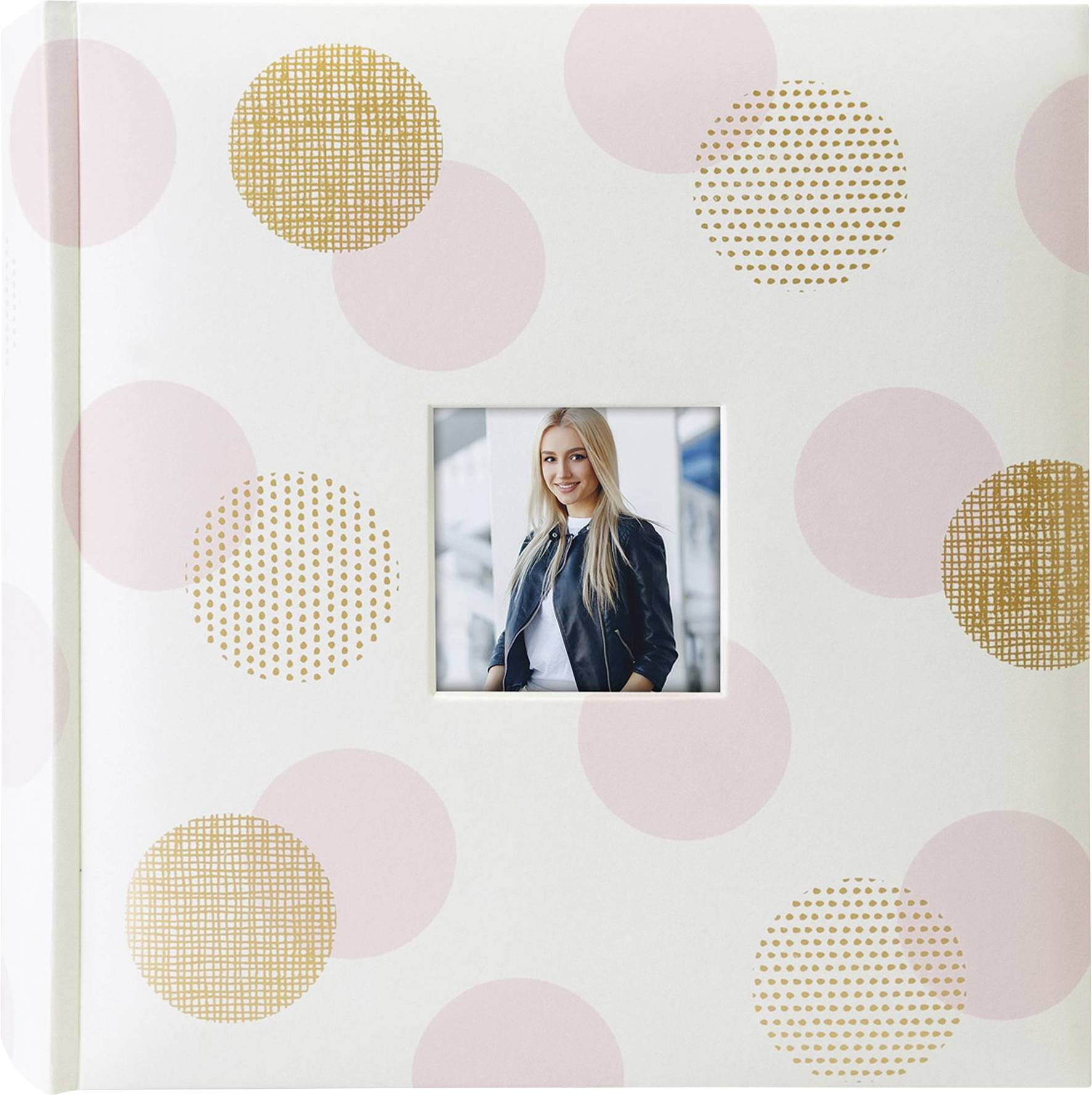Fotobuch mit rosa und goldenen Punkten auf dem Cover. In der Mitte ein kleines Foto einer Person.
