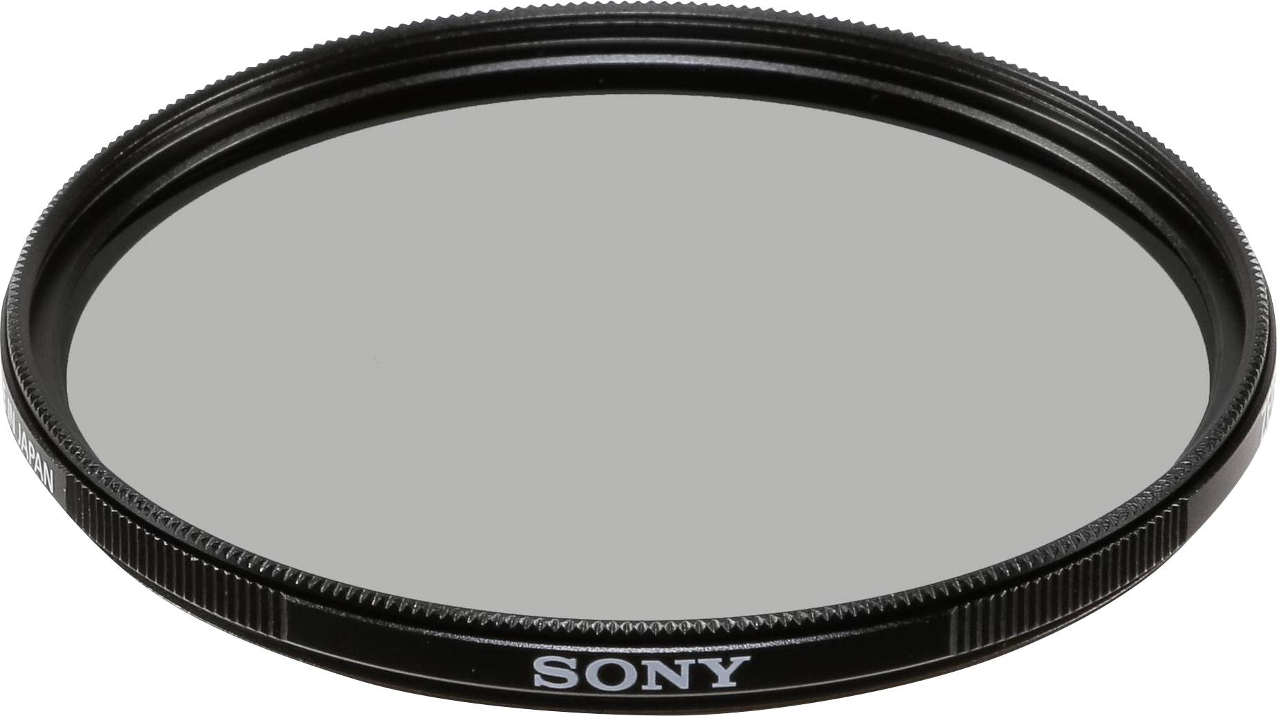 Ein runder Kamera-Filter von Sony, schwarz gerändelt, auf einer ebenen Fläche liegend.
