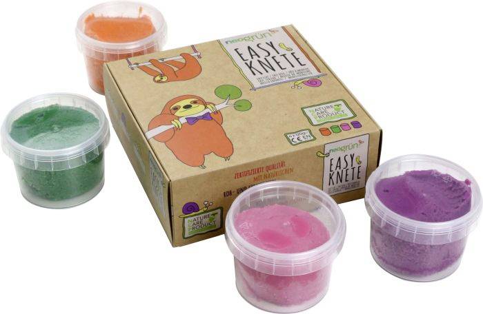 Vier Behälter mit buntem Knetmaterial (orange, grün, pink, lila) umgeben eine Packung mit einem illustrierten Faultier.