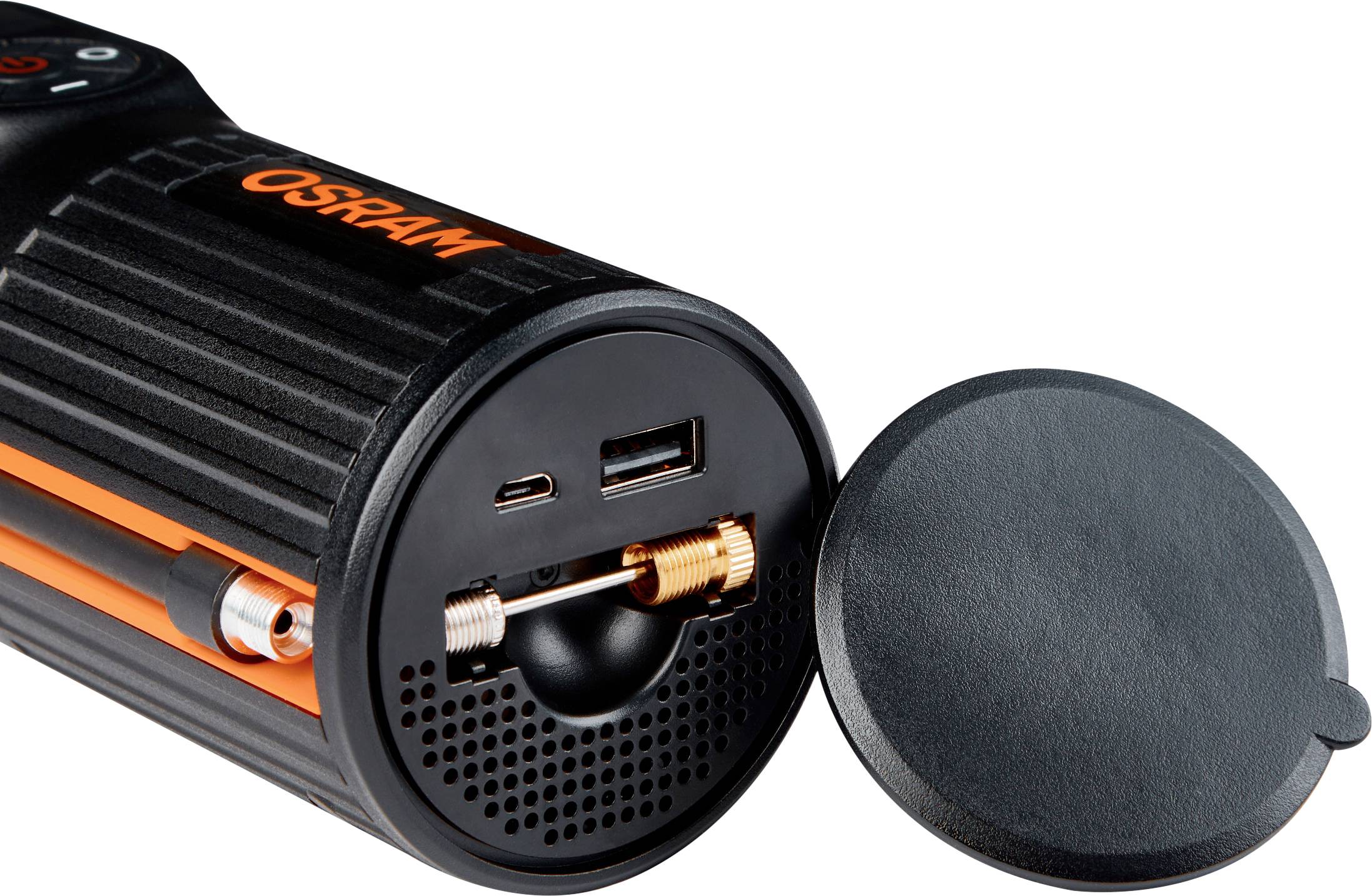 Schwarzer OSRAM Reifenfüller mit abgenommenem Deckel zeigt USB- und Micro-USB-Anschlüsse sowie einen Anschluss für Druckluftpumpen.