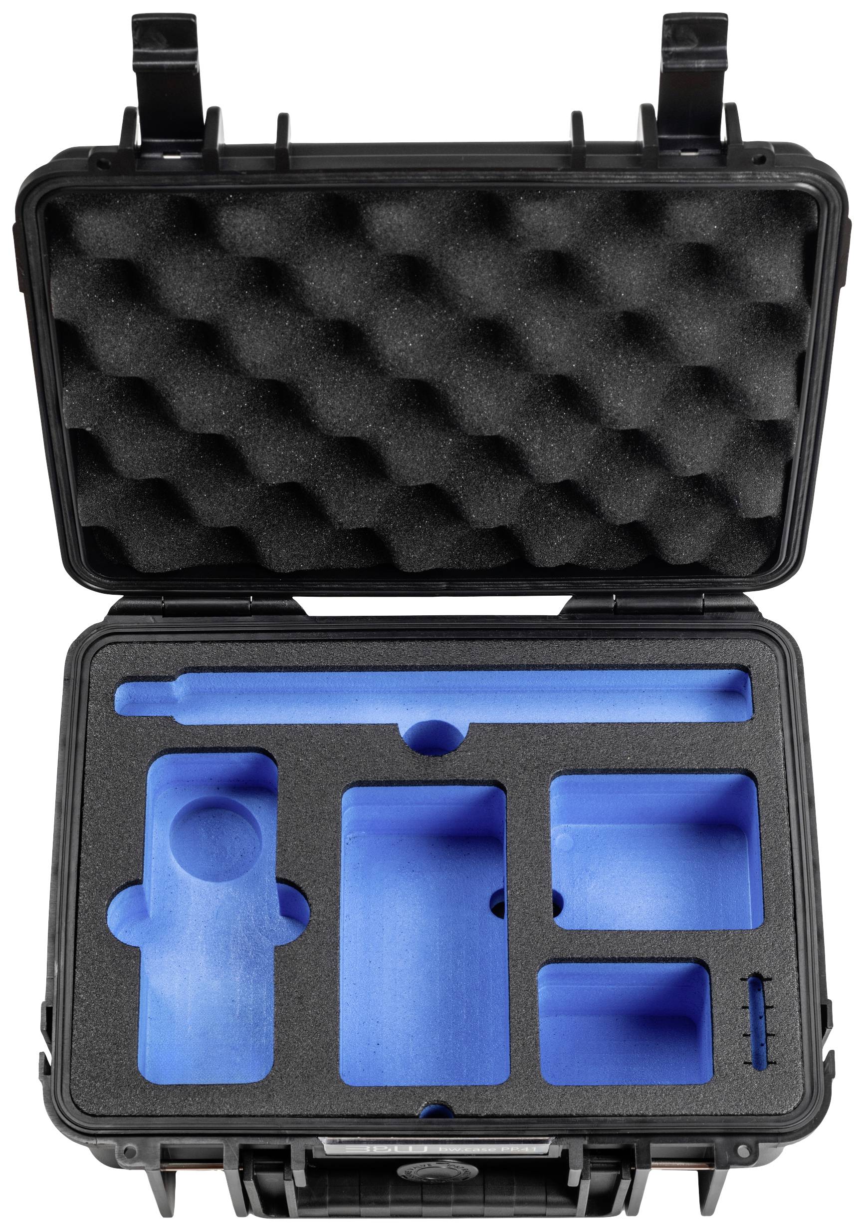 Ein offener schwarzer Hartschalenkoffer mit blauer Schaumstoffeinlage, die speziell geformte Aussparungen für verschiedene Gegenstände hat.