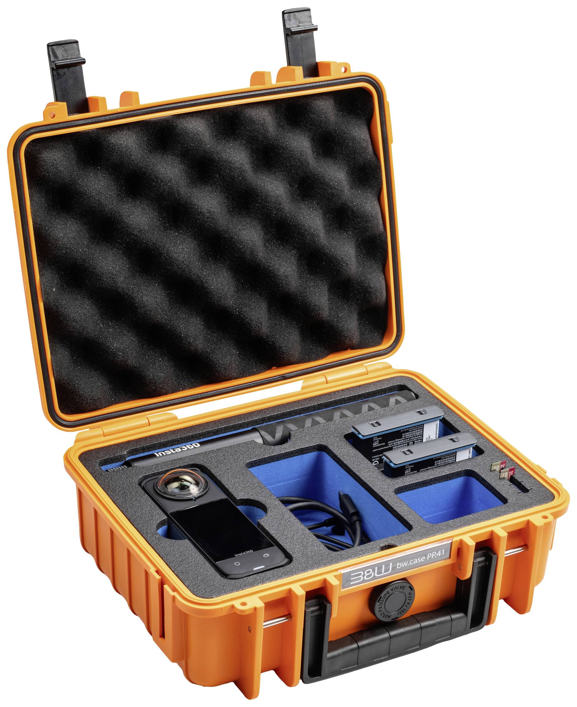 Oranger Koffer mit Schaumstoffeinlagen enthält Kamera und Zubehör in Fächern.