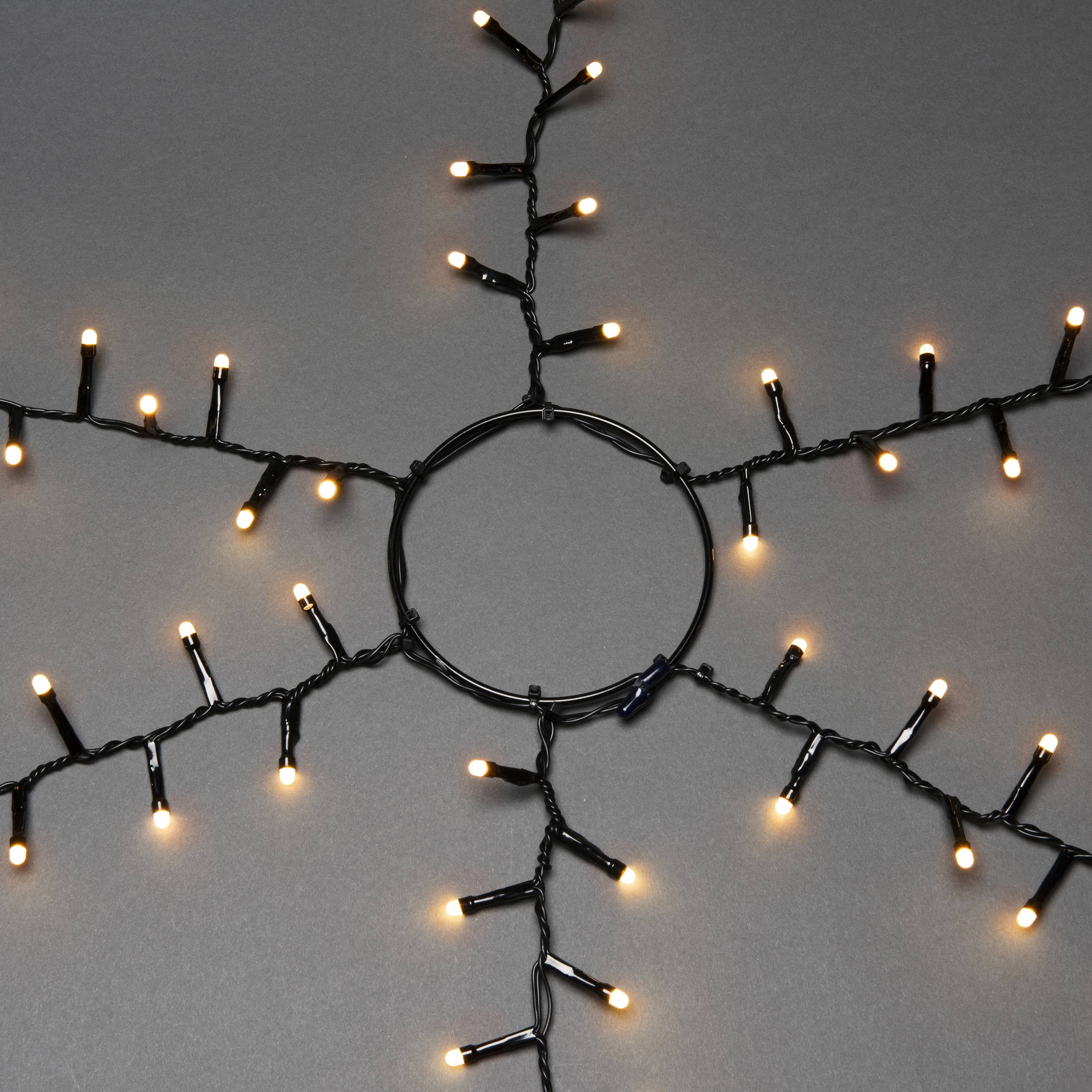 Konstsmide 6650-830 LED-Baummantel Außen EEK: F (A - G) netzbetrieben Anzahl Leuchtmittel 660 LED Bernstein Beleuchtete Länge