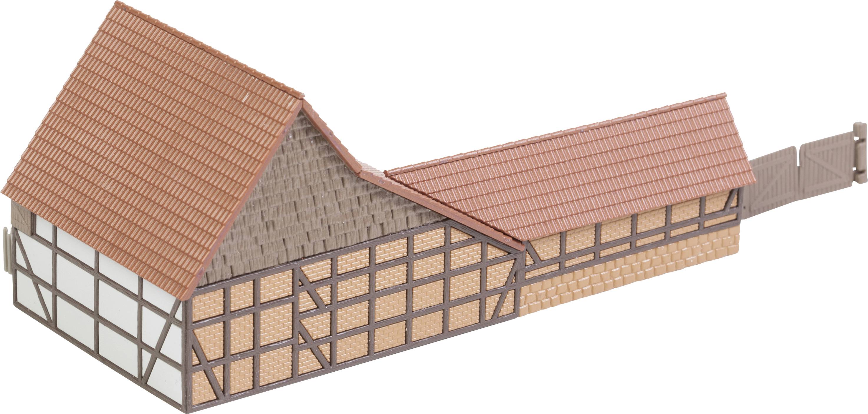 Ein Modell eines traditionellen Fachwerkhauses mit roten Dachziegeln und Holzbalkenstruktur, typisches europäisches Architekturdesign.