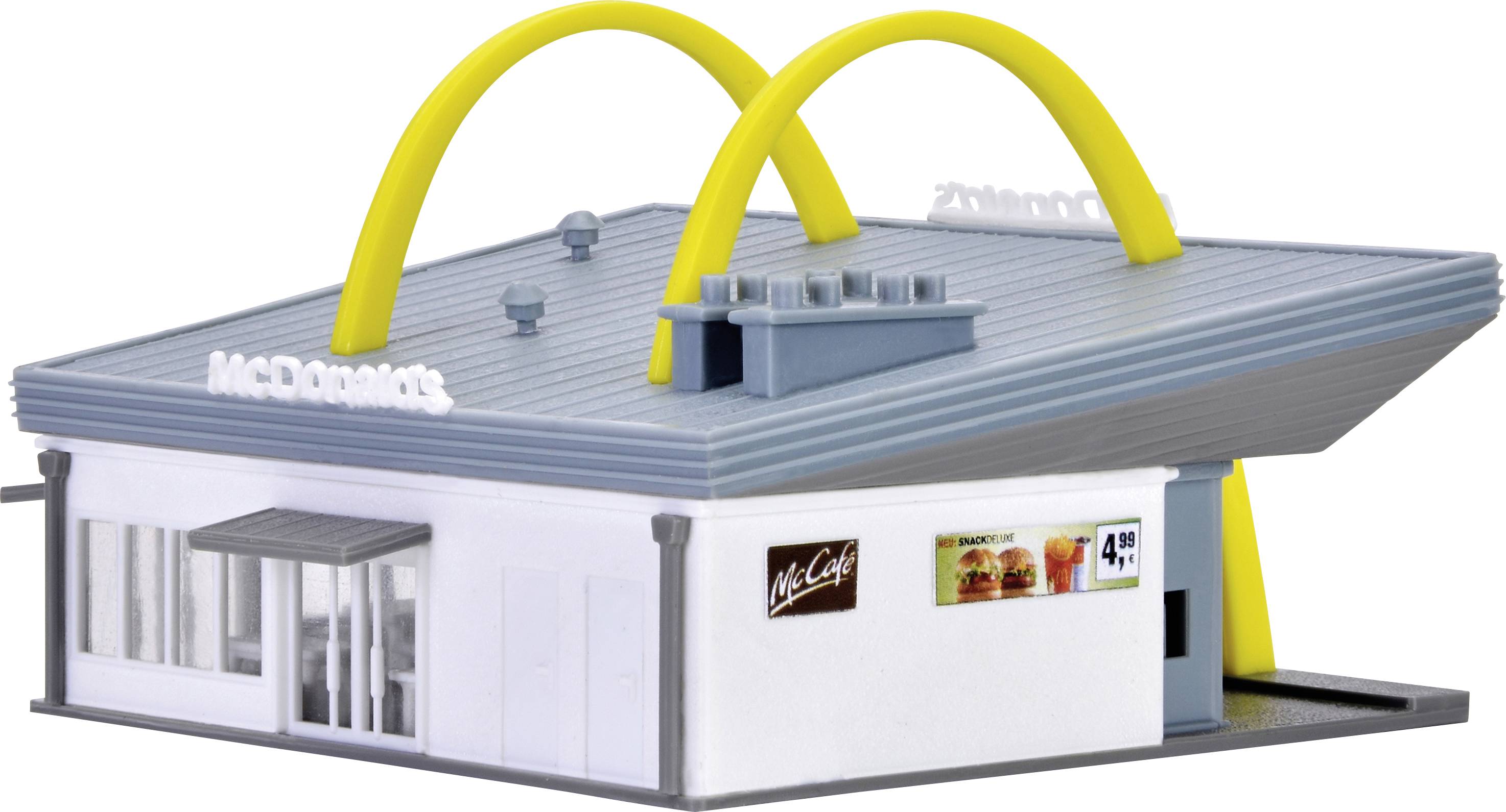 Ein Miniaturmodell eines Fast-Food-Restaurants mit charakteristischen gelben Bögen auf dem Dach.