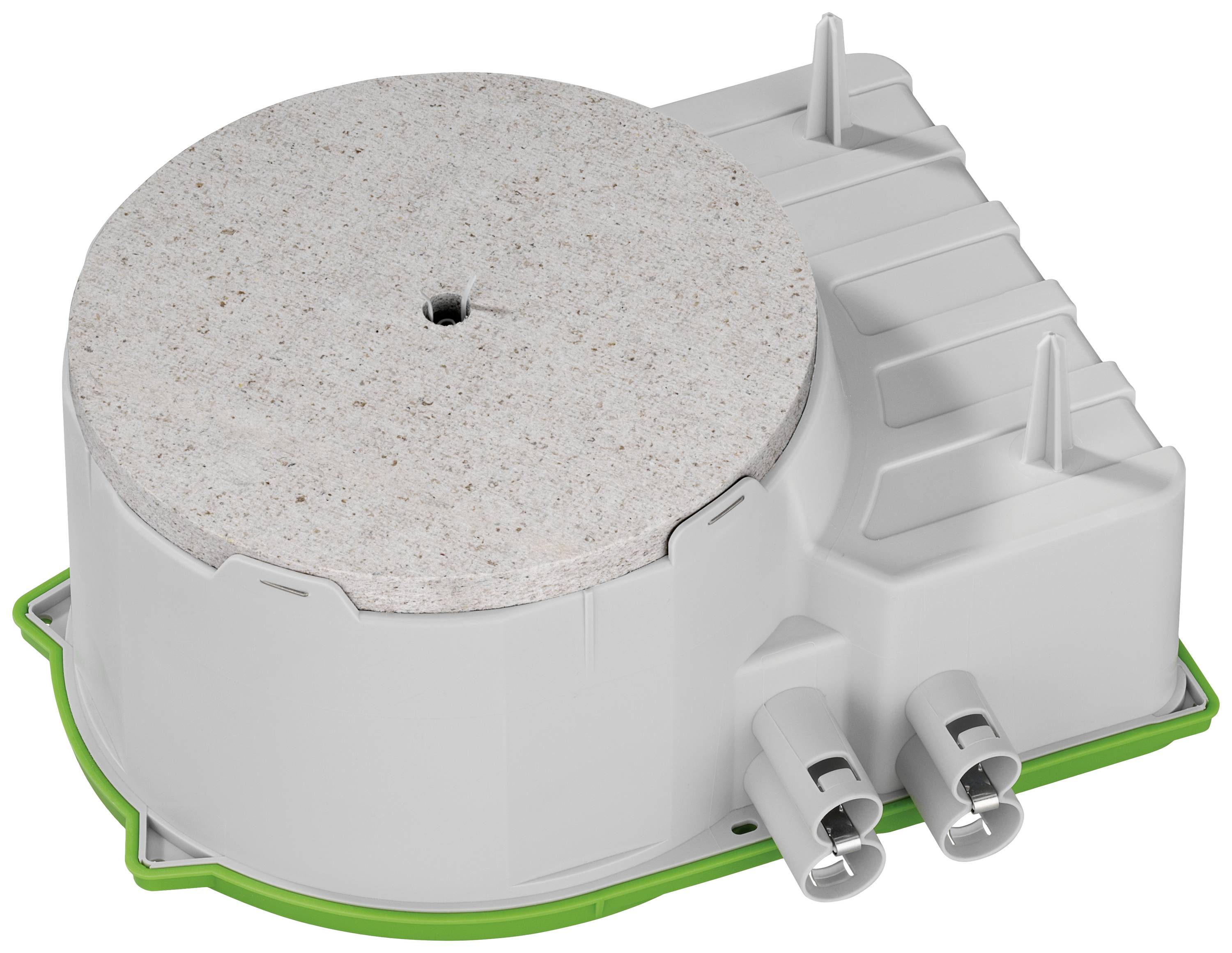 Ein weiß-graues Gerät mit zwei Anschlüssen auf einer grünen Basis, möglicherweise ein technisches Bauteil oder Filter.