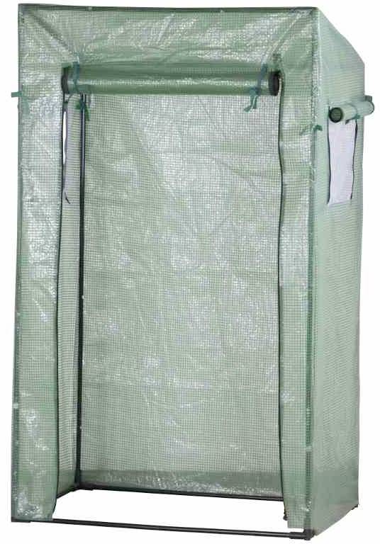 Grünes Gewächshaus aus Kunststoff mit transparentem Überzug und aufrollbarer Tür. Geeignet für kleine Pflanzenanbauprojekte.