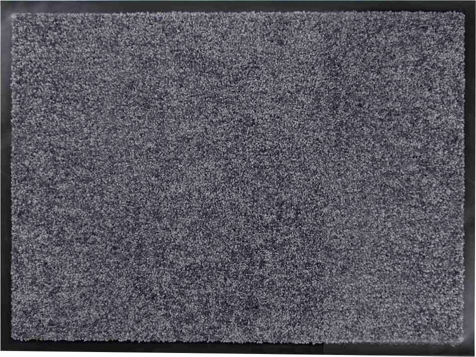 Grauer rechteckiger Teppich mit flauschiger Textur.