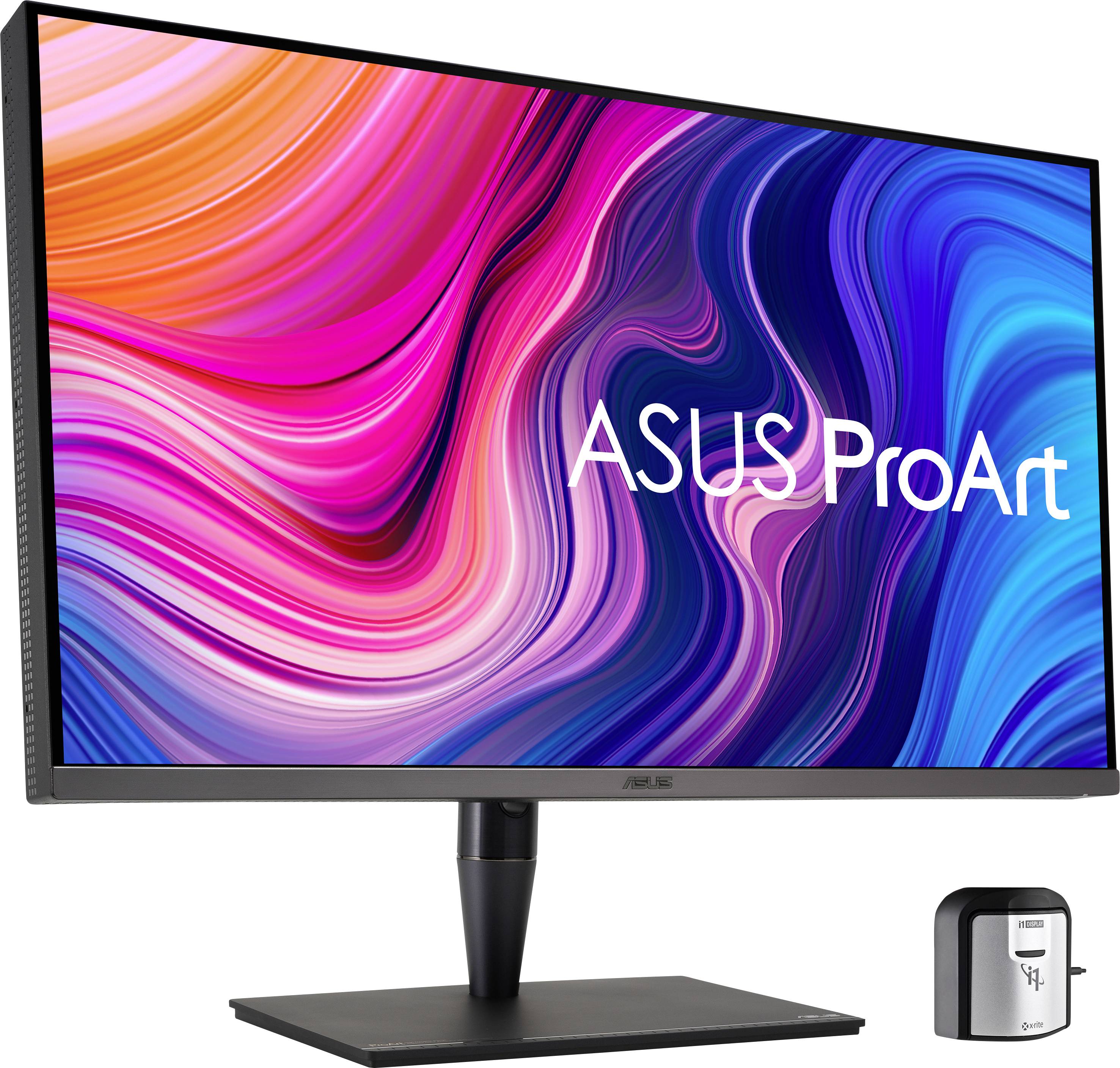 Ein ASUS ProArt Monitor mit leuchtenden Farben auf dem Bildschirm. Daneben steht ein kleines, schwarzes Gerät zur Kalibrierung.