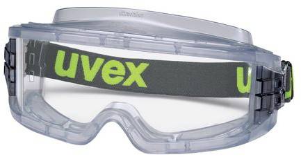 Schutzbrille mit transparentem Visier und grauem Band, auf dem 'uvex' in grüner Schrift steht. Entwickelt für Augensicherheit.