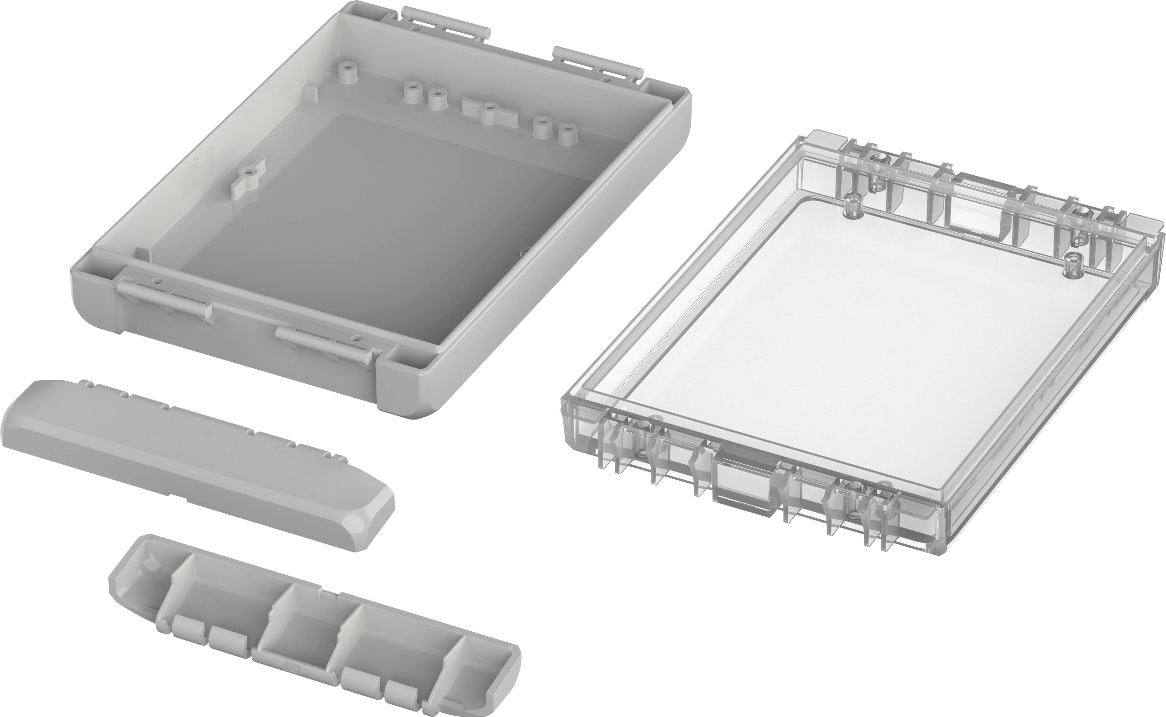 Gehäuse aus Kunststoff, bestehend aus vier Einzelteilen. Links ein vollständiger Kasten, rechts das transparente Oberteil. Unten zwei schmale Bauteile.