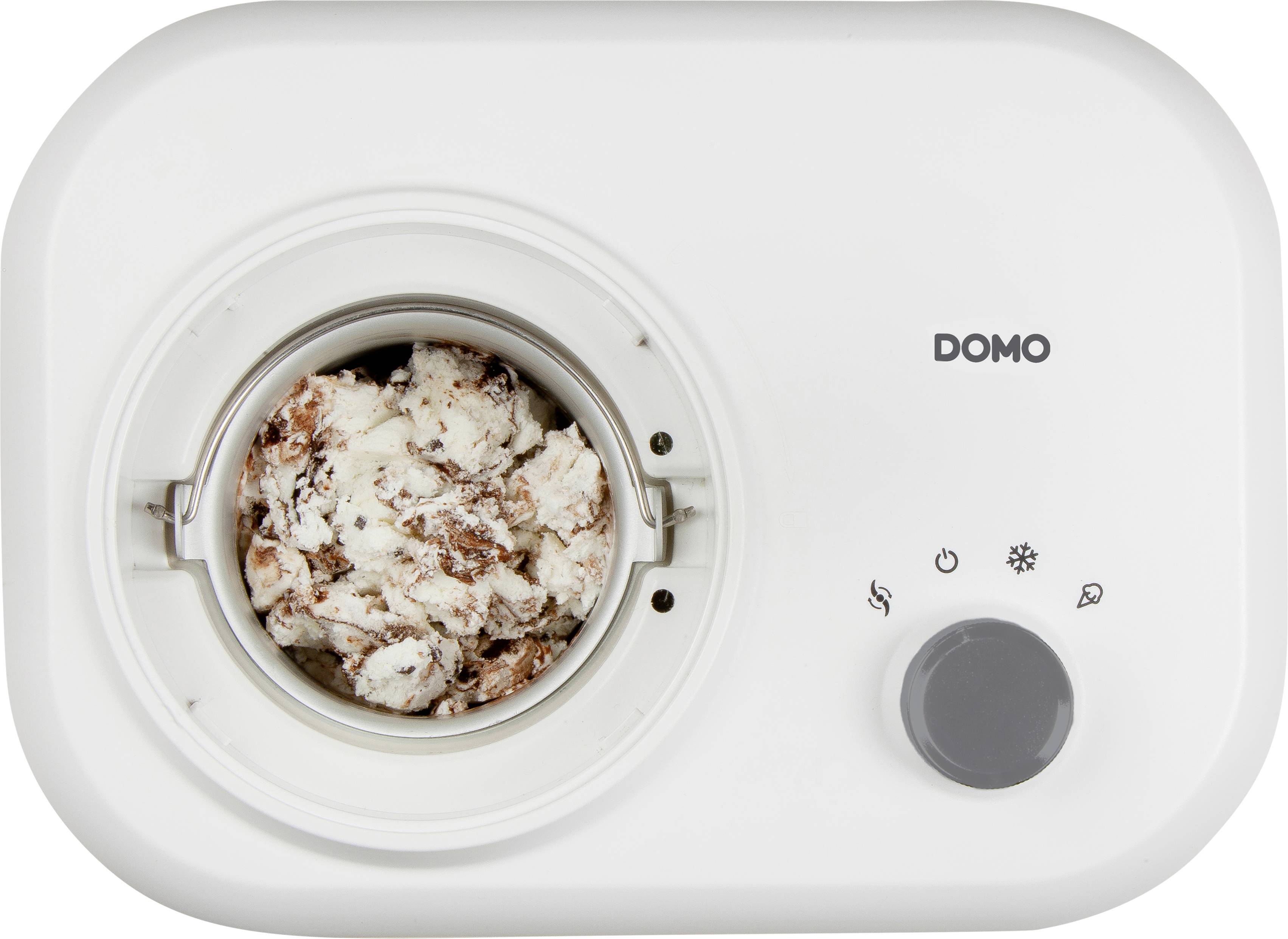 Eismaschine mit Rühreinsatz, gefüllt mit schokoladenartigem Eis, Markenname 'DOMO' auf der Seite, Bedienelemente und Drehknopf sichtbar.