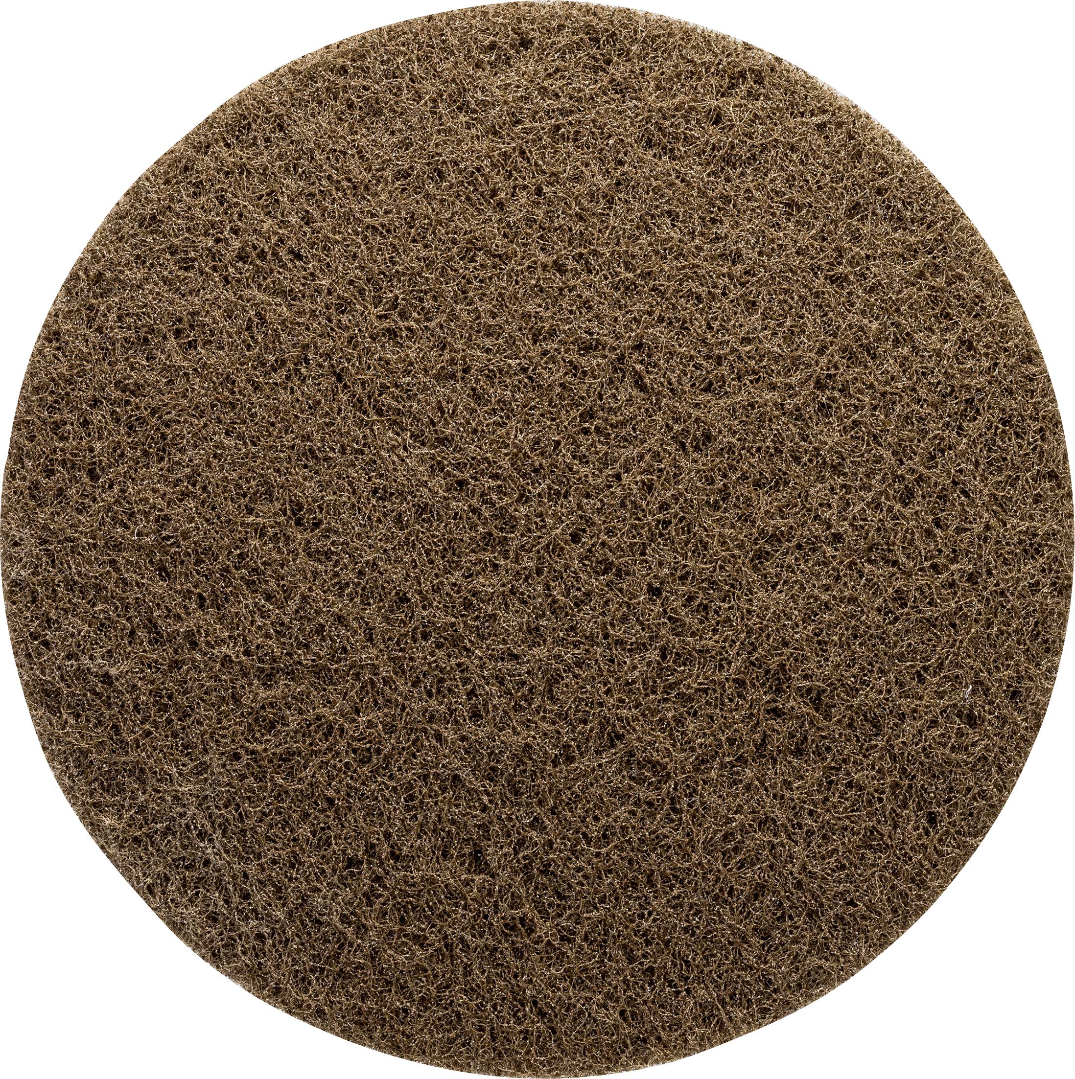 Eine braune, runde Scheuerschwammoberfläche mit offener Struktur, typisch für Reinigungszwecke.