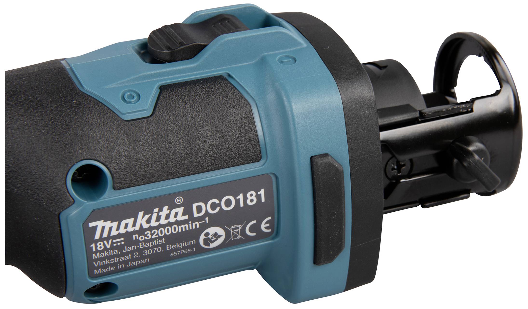 Ein blau-schwarzes Makita-Gerät mit der Modellnummer DCO181. Das Etikett zeigt technische Details und Herkunftsort.