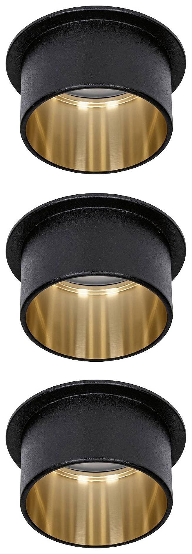 Drei schwarze zylindrische Deckenleuchten mit goldener Innenbeschichtung, angeordnet in einer vertikalen Reihe.