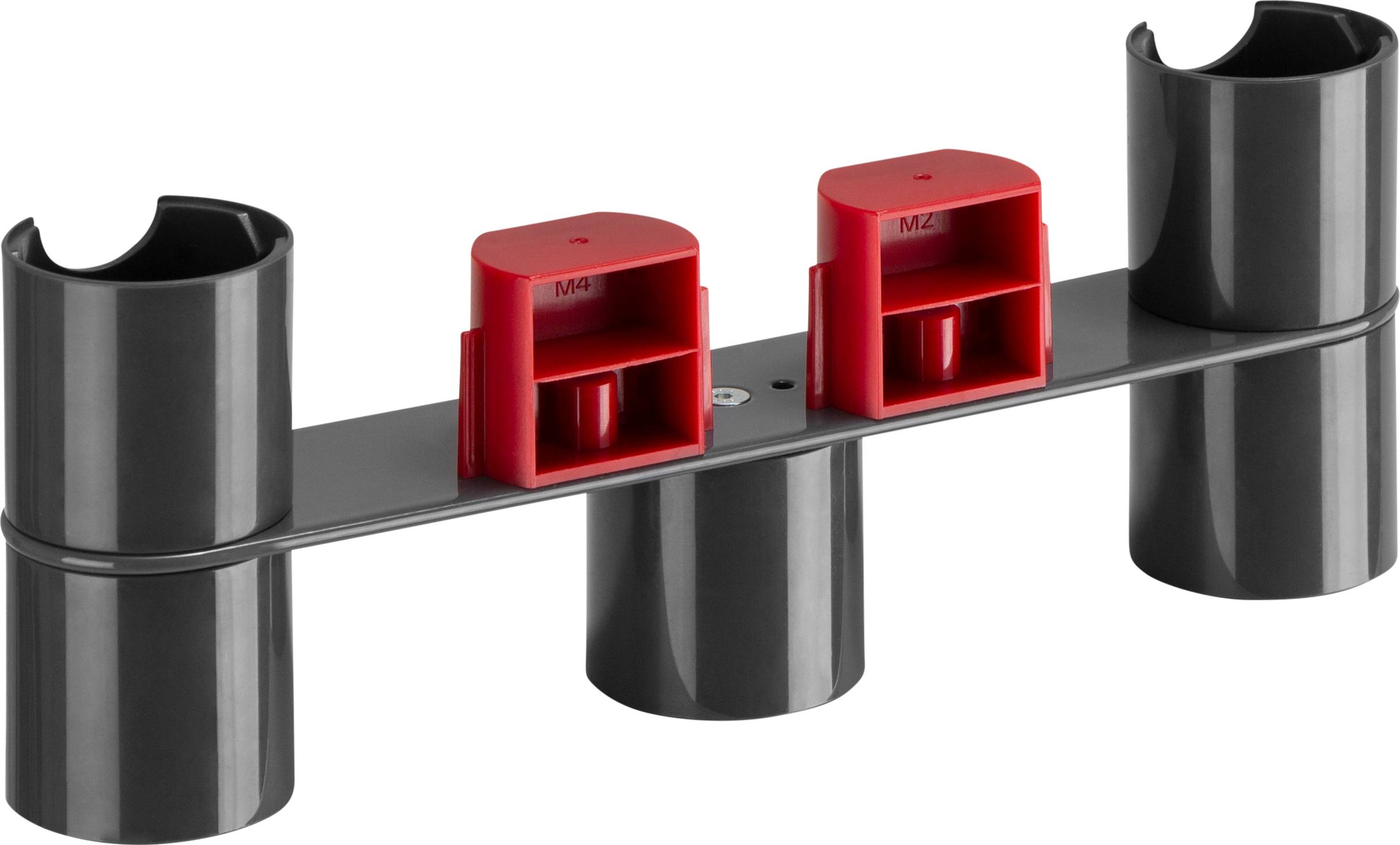 Eine graue Kunststoffhalterung mit vier vertikalen Röhren und zwei roten, rechteckigen Einsätzen in der Mitte.