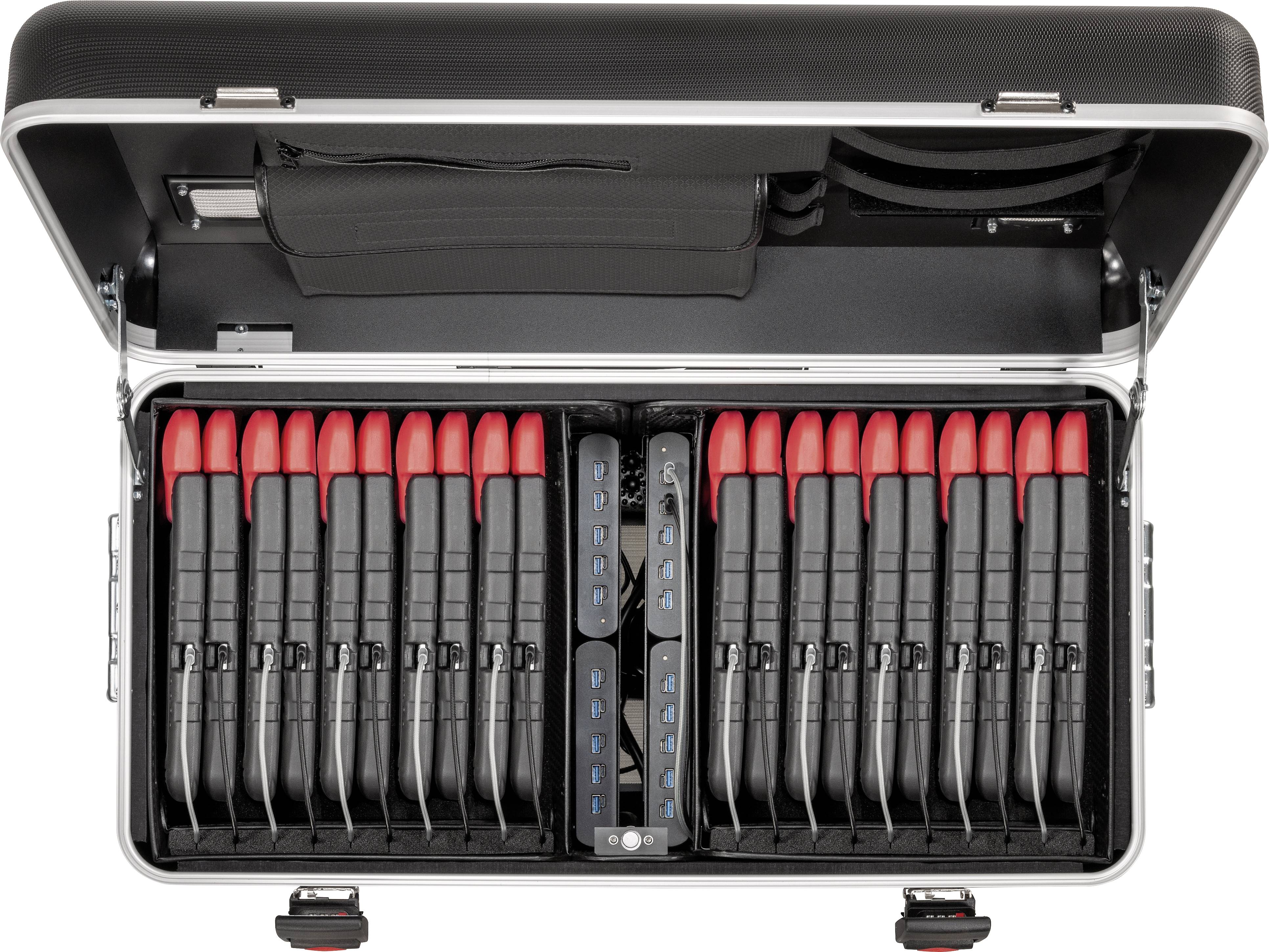 Offener Koffer mit mehreren aufgereihten schwarzen Geräten mit roten Enden, geordnet in zwei Reihen. Nebenfächer oben sichtbar.